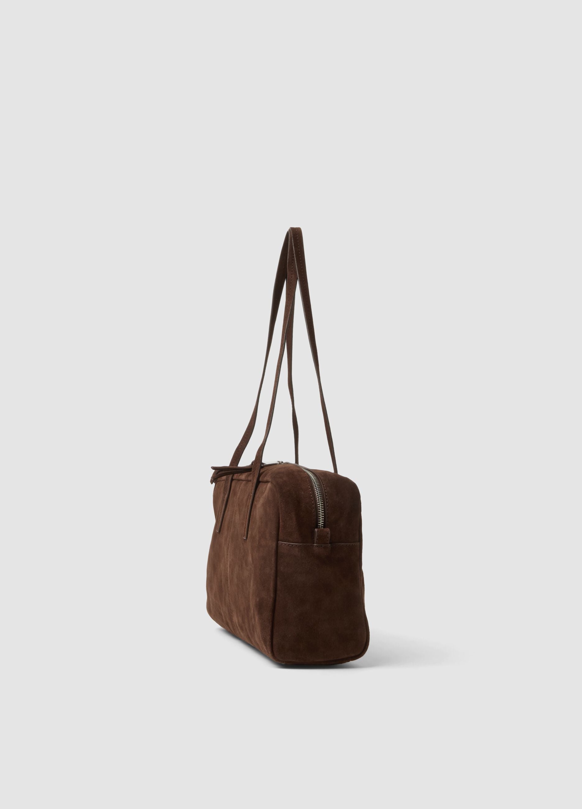 Brown genuine leather handbag with double handles and zip