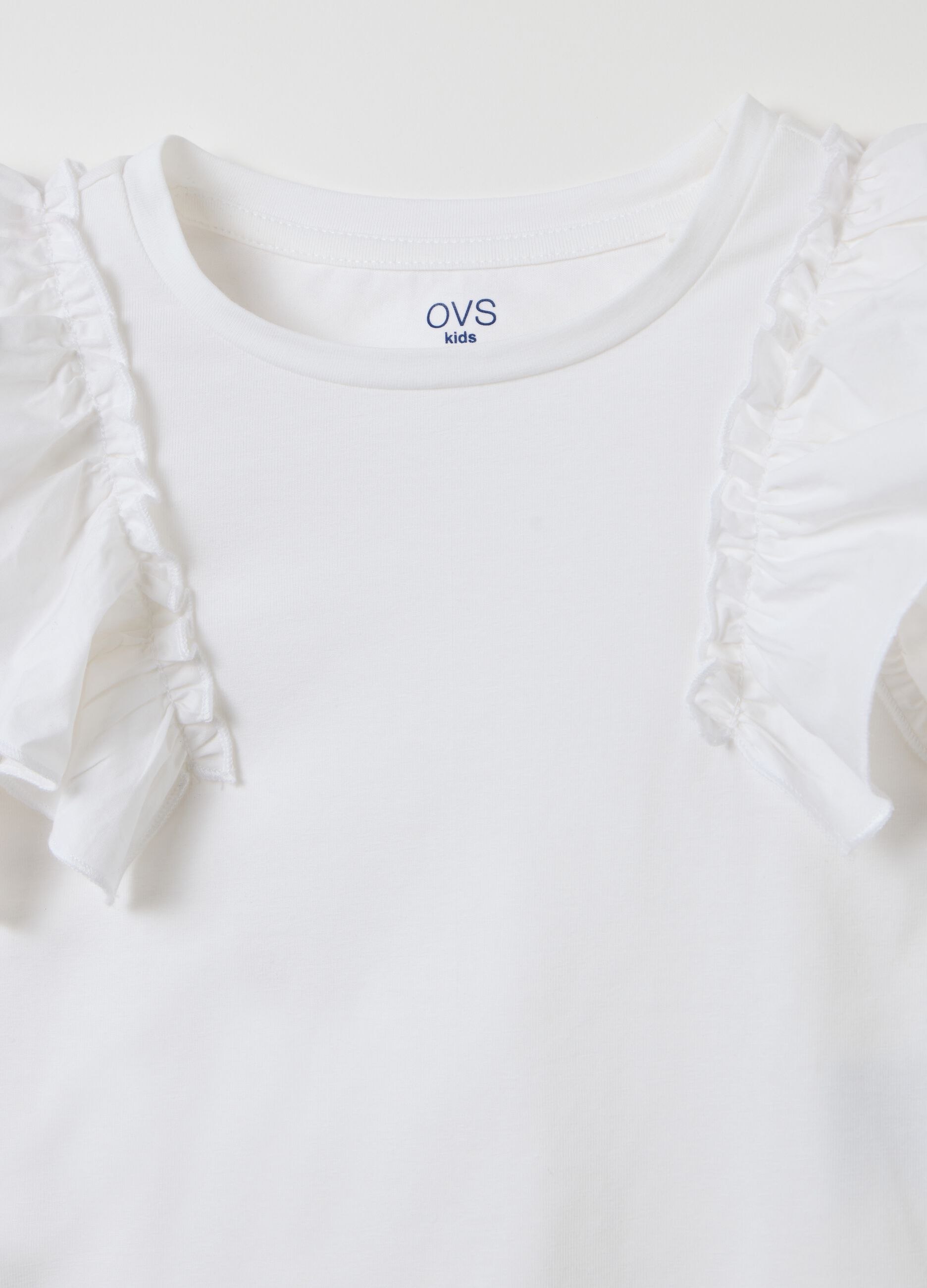 White short-sleeved T-shirt with flounces