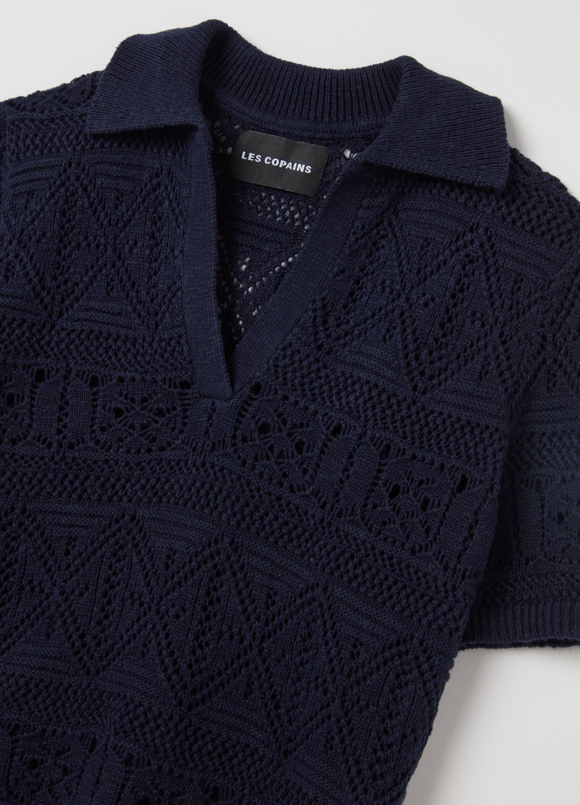 Maglia crochet con scollo a polo
