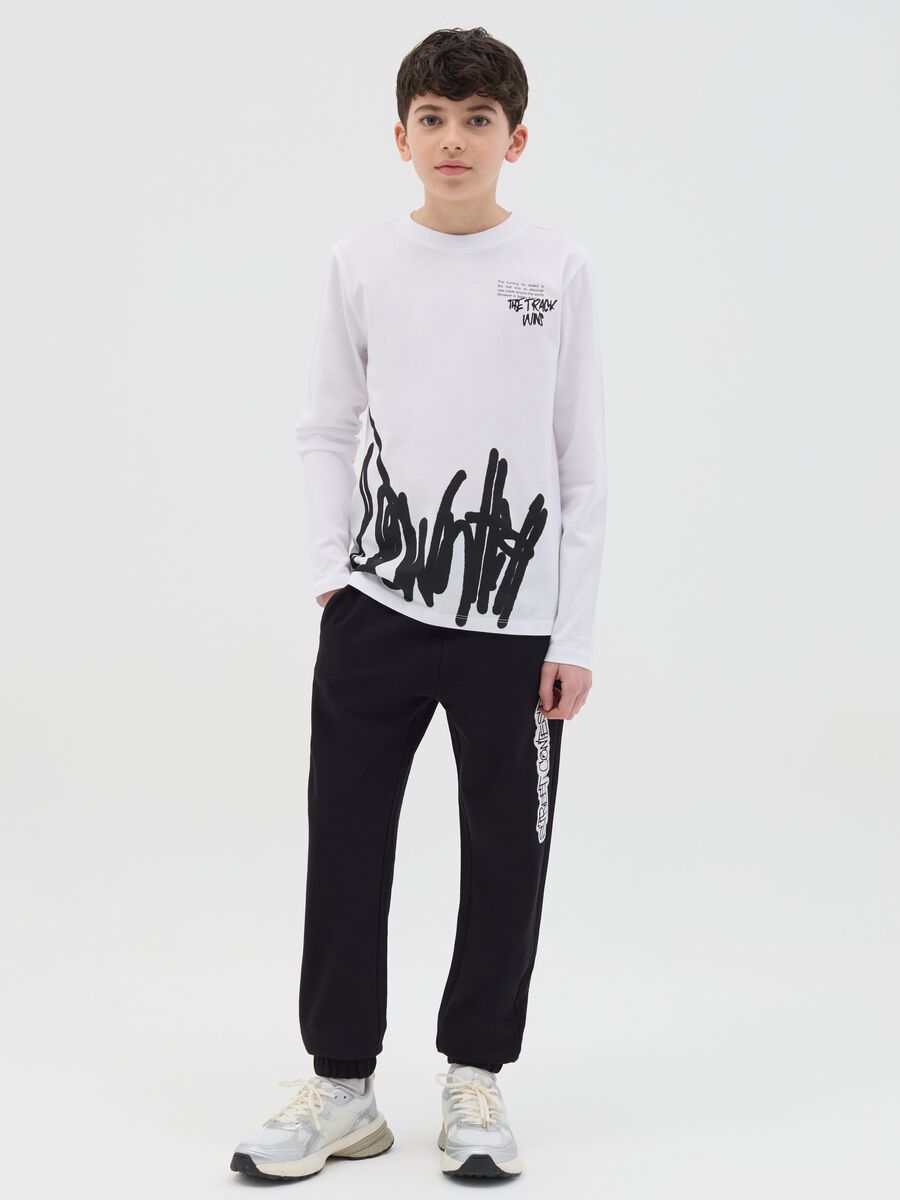 Plush joggers with drawstring and print_1