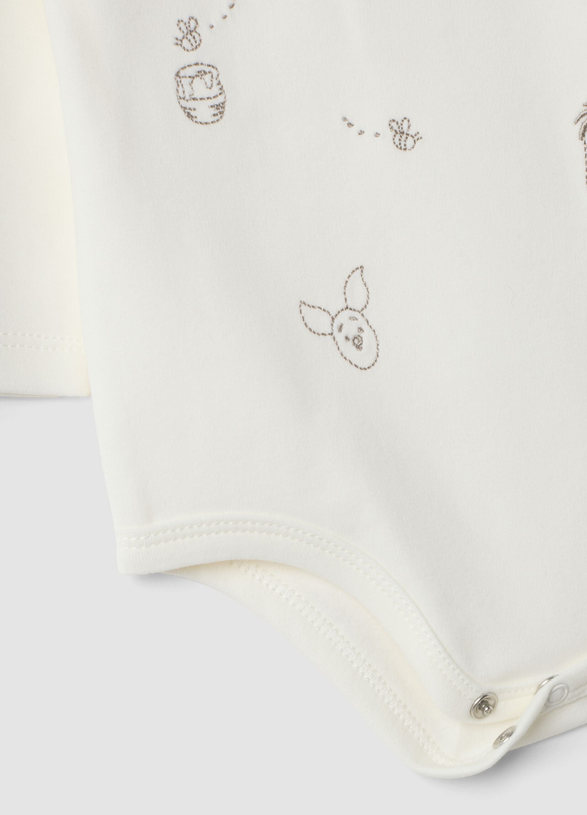 White organic cotton baby bodysuit with collar and Winnie the Pooh print