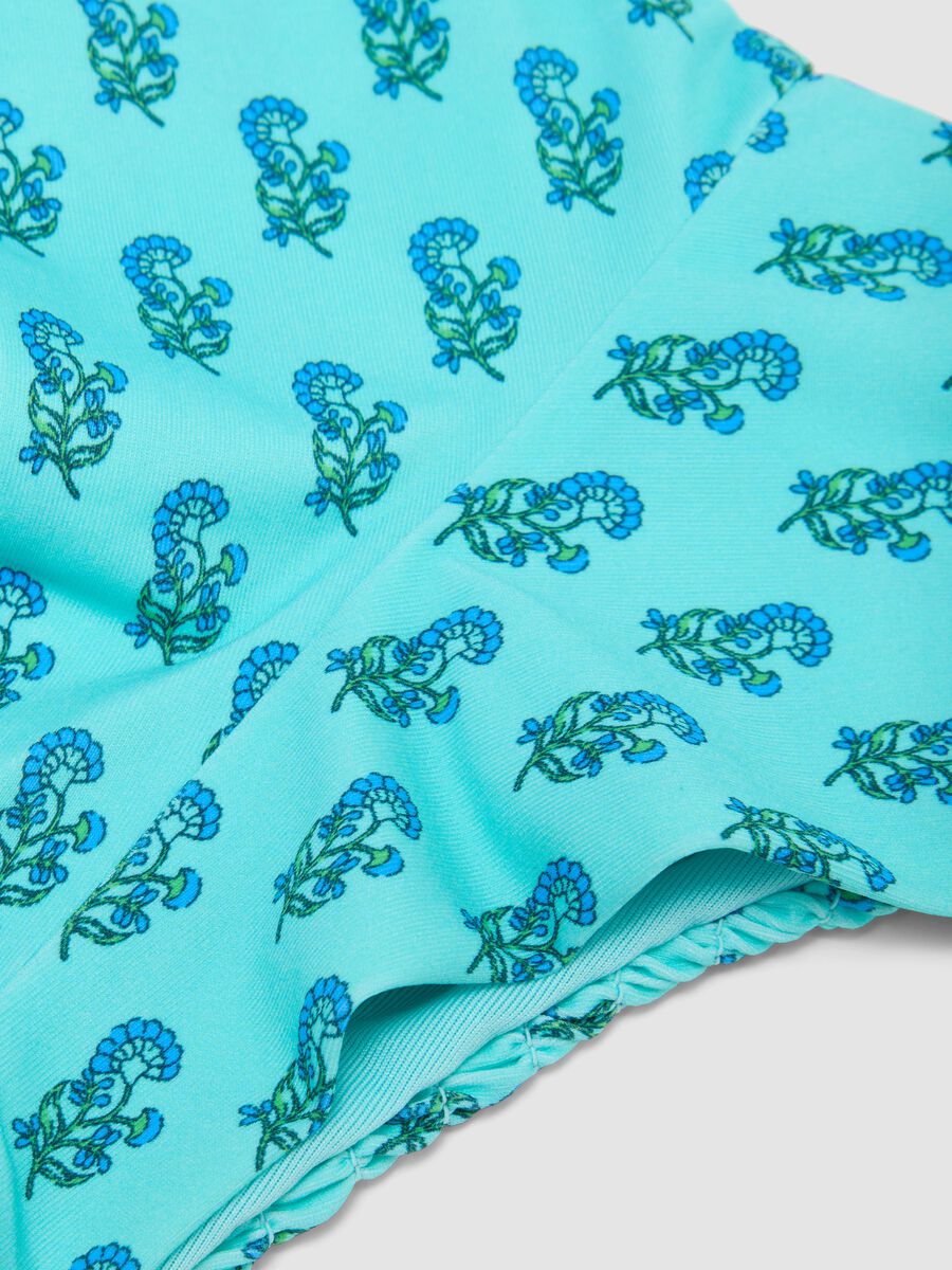 Slip bikini azzurro in tessuto elasticizzato_5
