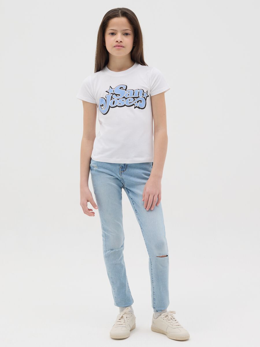 Jeans slim fit con abrasioni _1