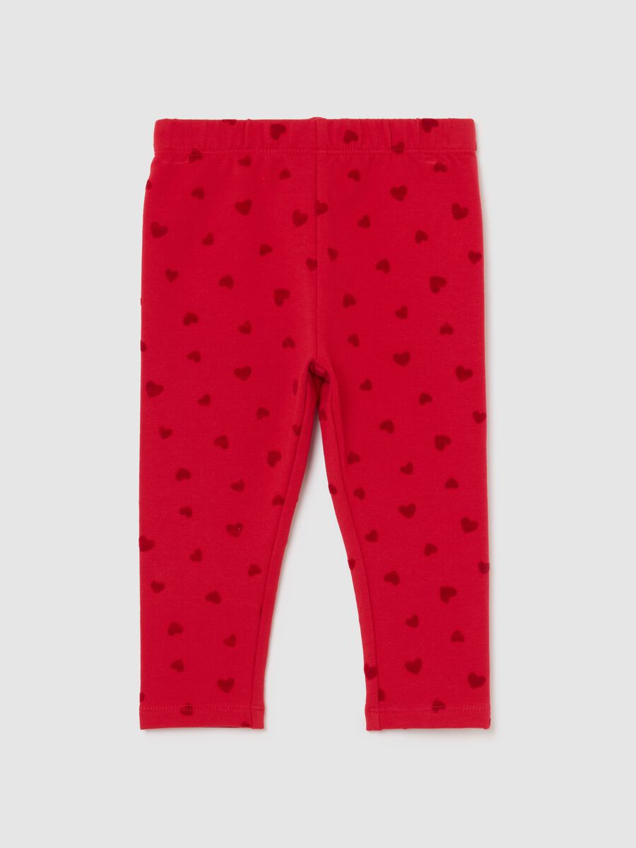 Red leggings for girls in stretch cotton with heart prints_0