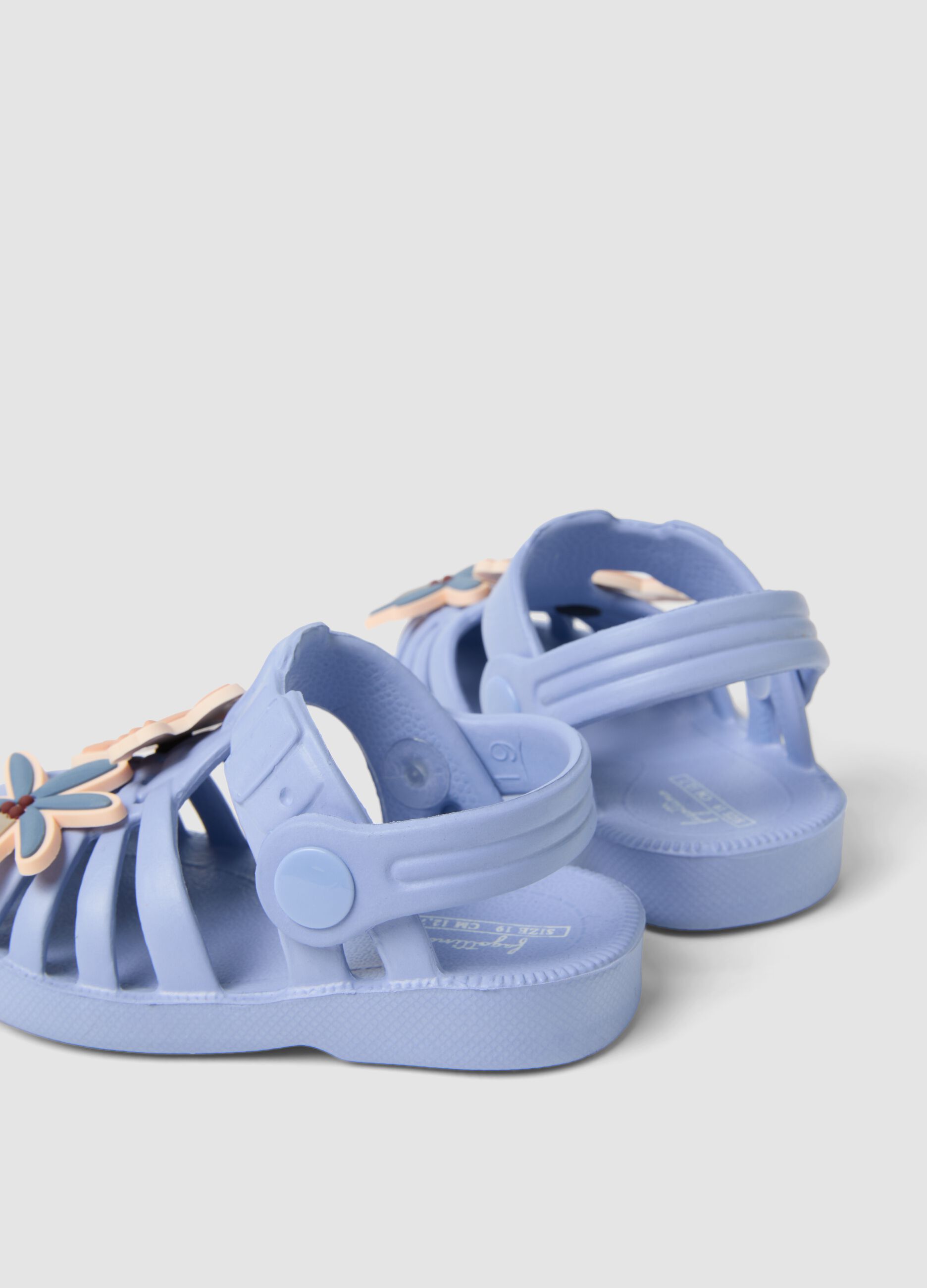 Baby blue sandals with decorative appliqu&eacute;s