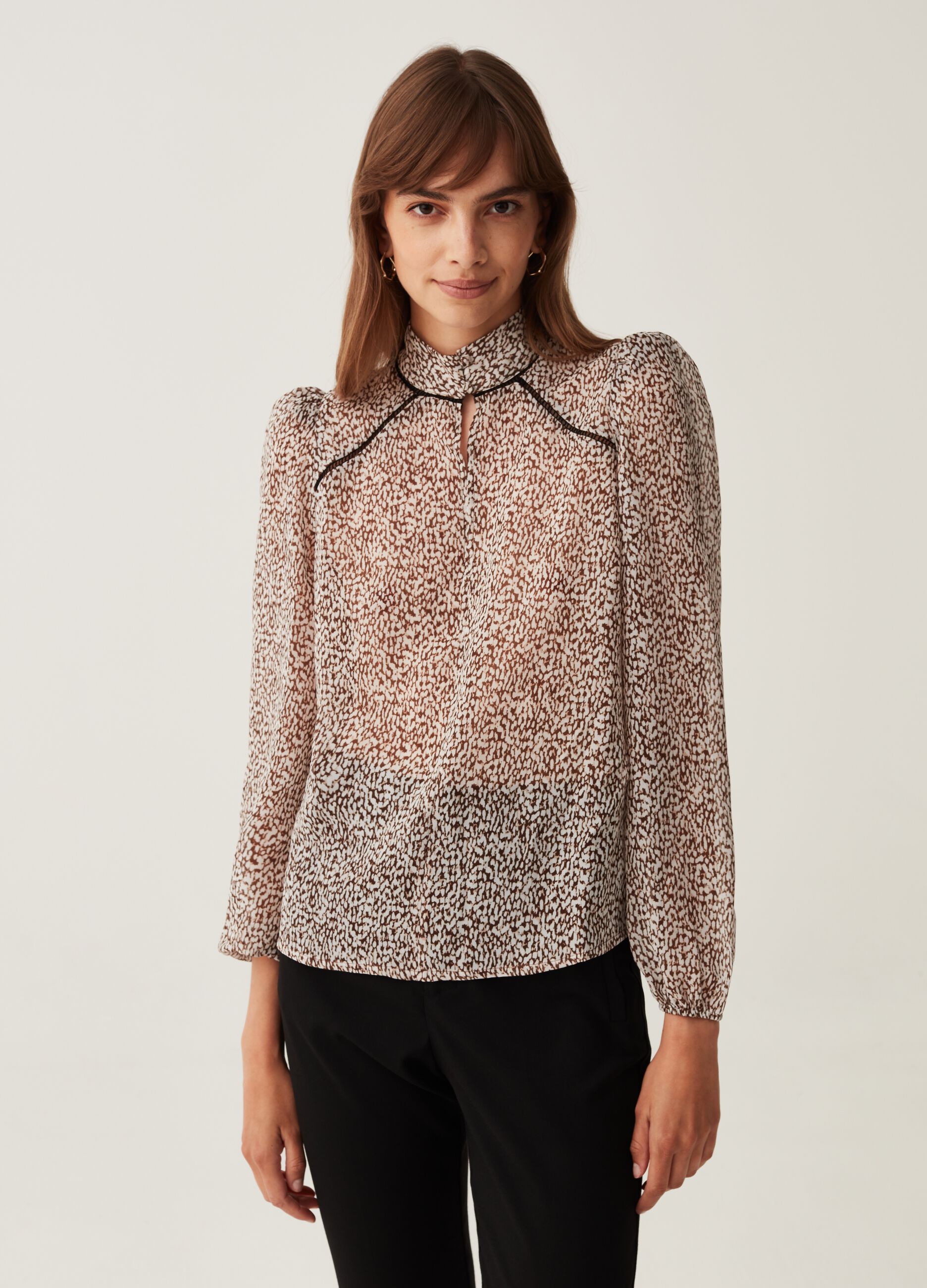 Blusa in cr pe con maniche a sbuffo
