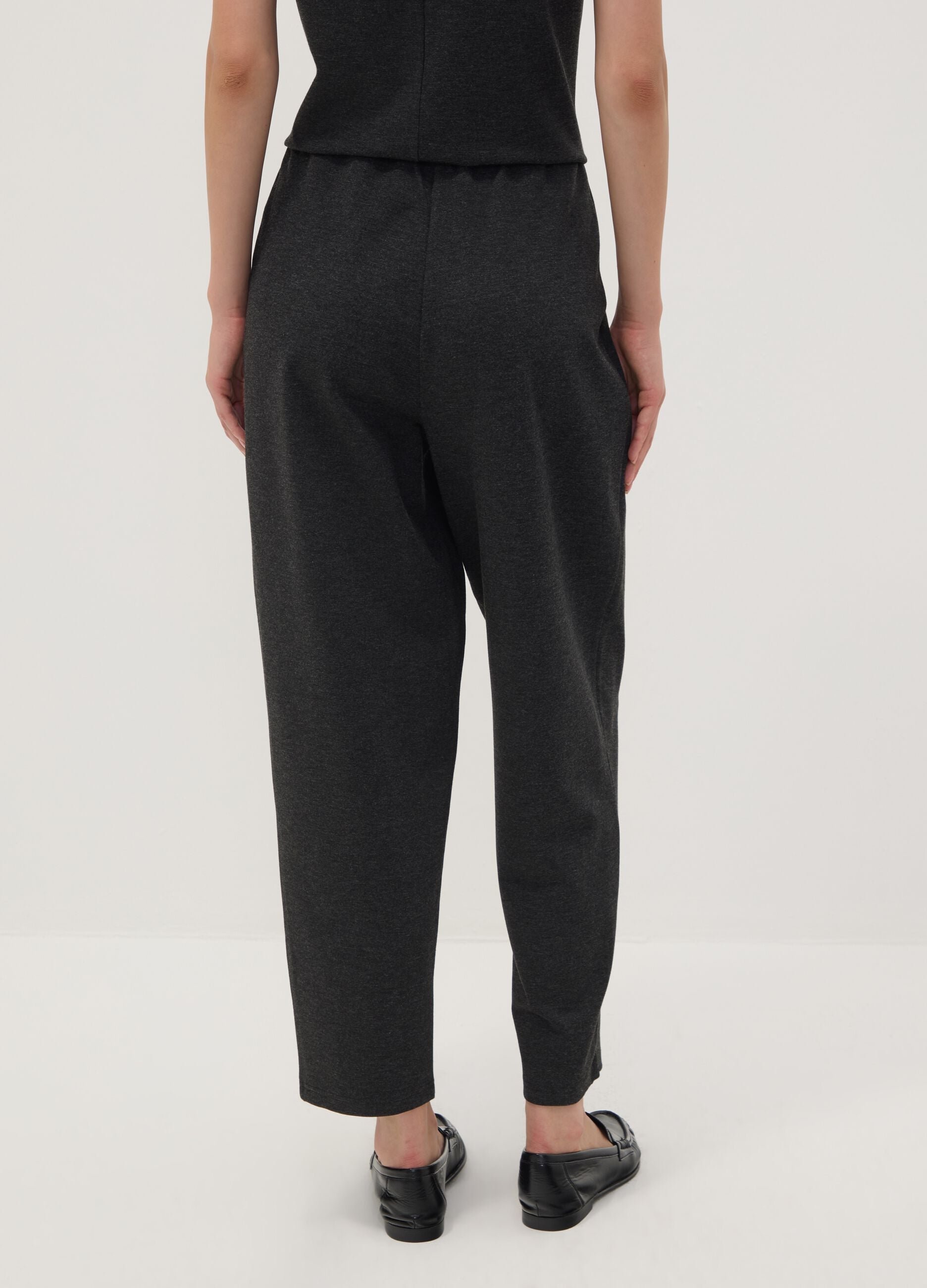 Black Milano-knit jogger trousers in stretch viscose, barrel fit