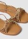 Brown flat sandals with braided tie-up straps_1