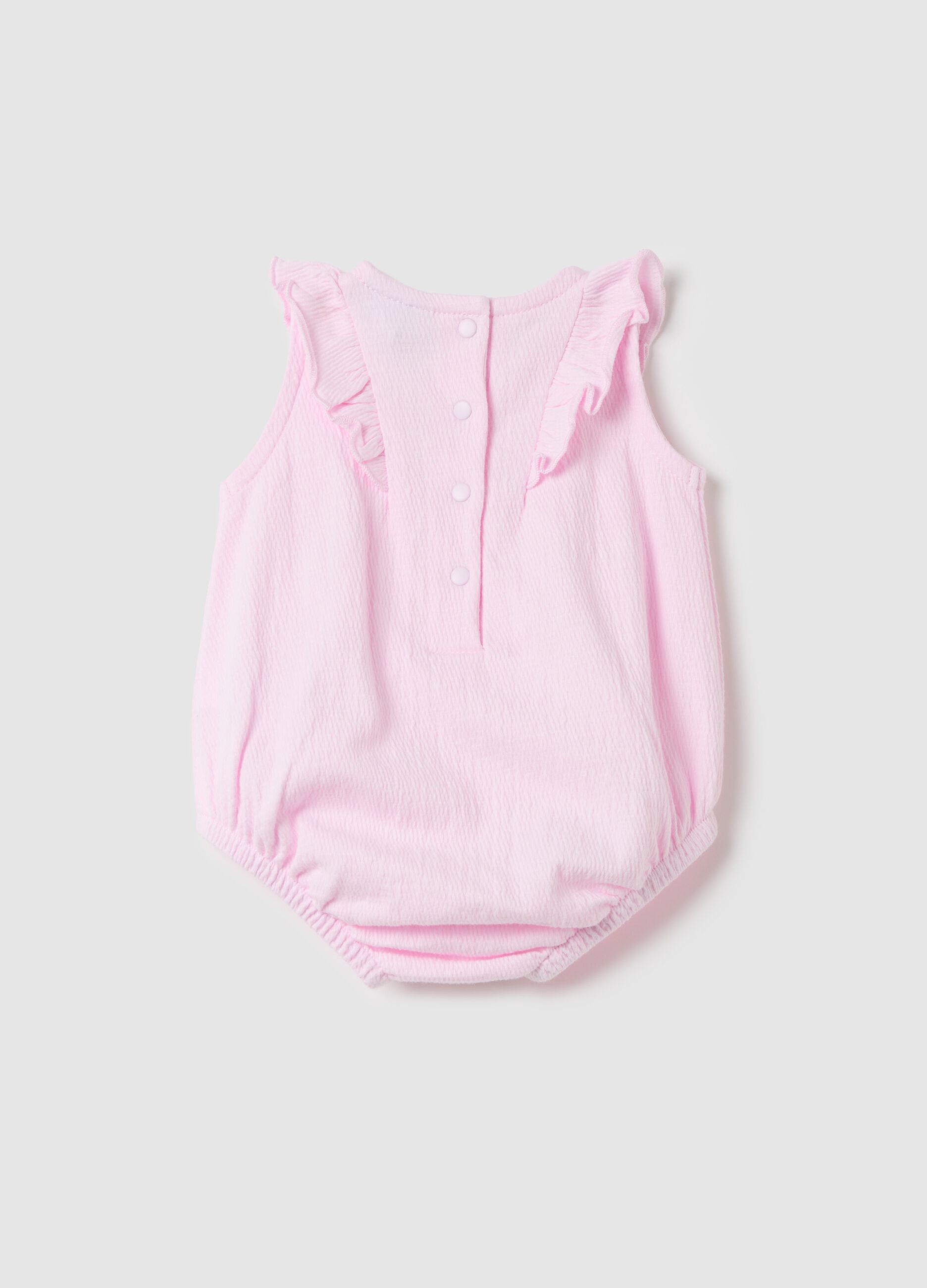 Pink sleeveless bodysuit with flounce