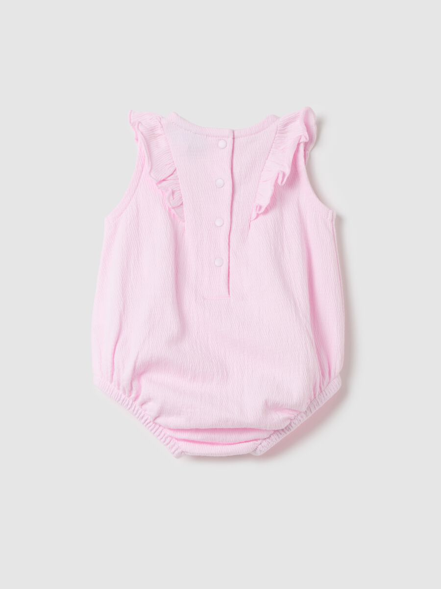Pink sleeveless bodysuit with flounce_1