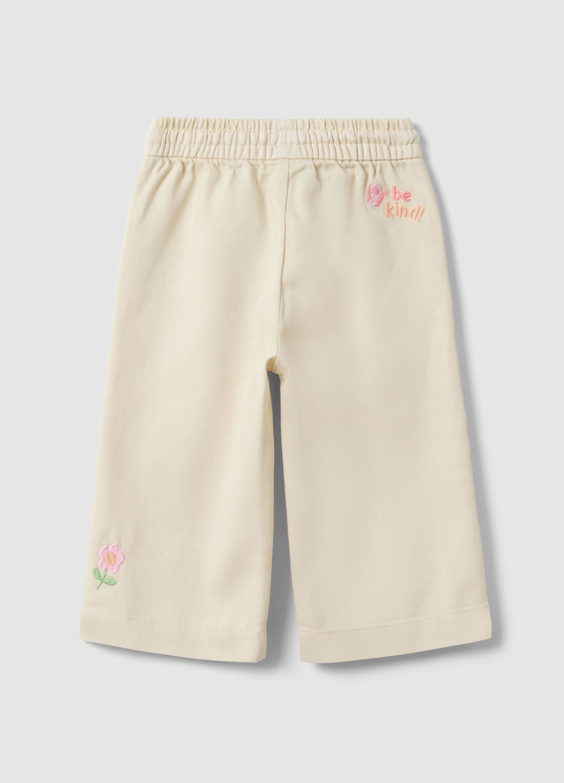 Beige wide-leg pure cotton trousers for baby girls with embroidered detailing