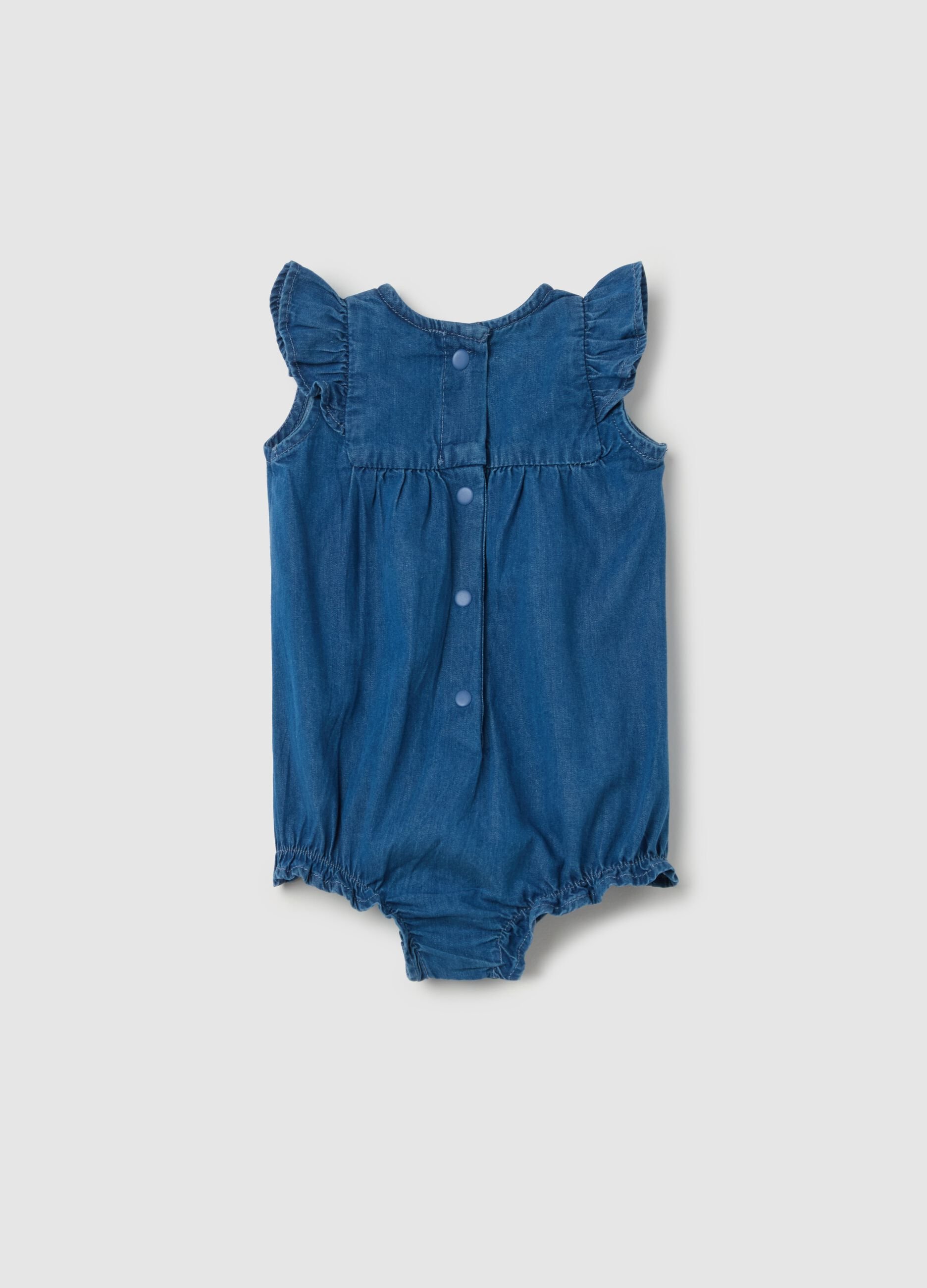 Denim romper suit with floral embroidery
