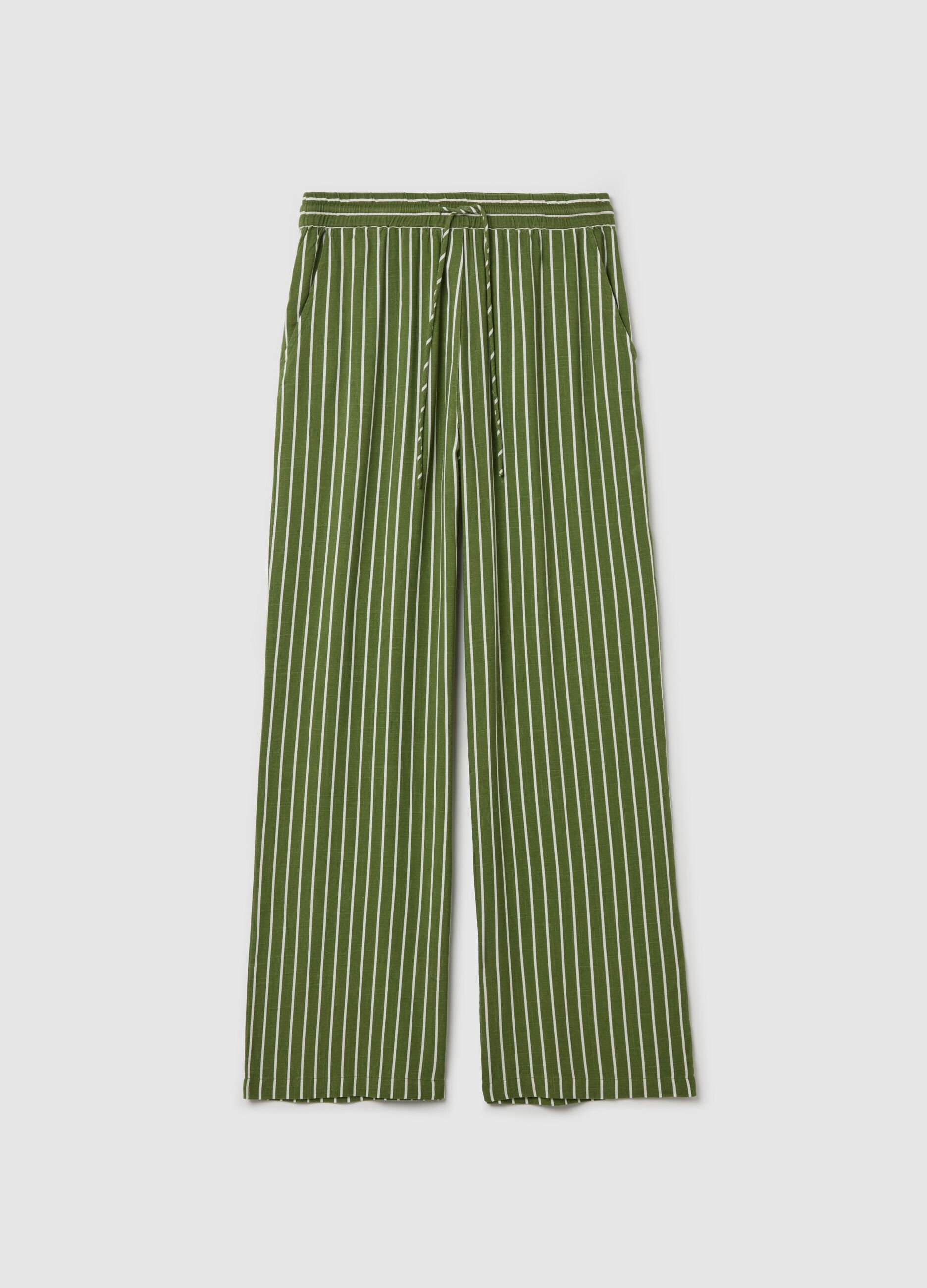 Striped green palazzo trousers in viscose and linen