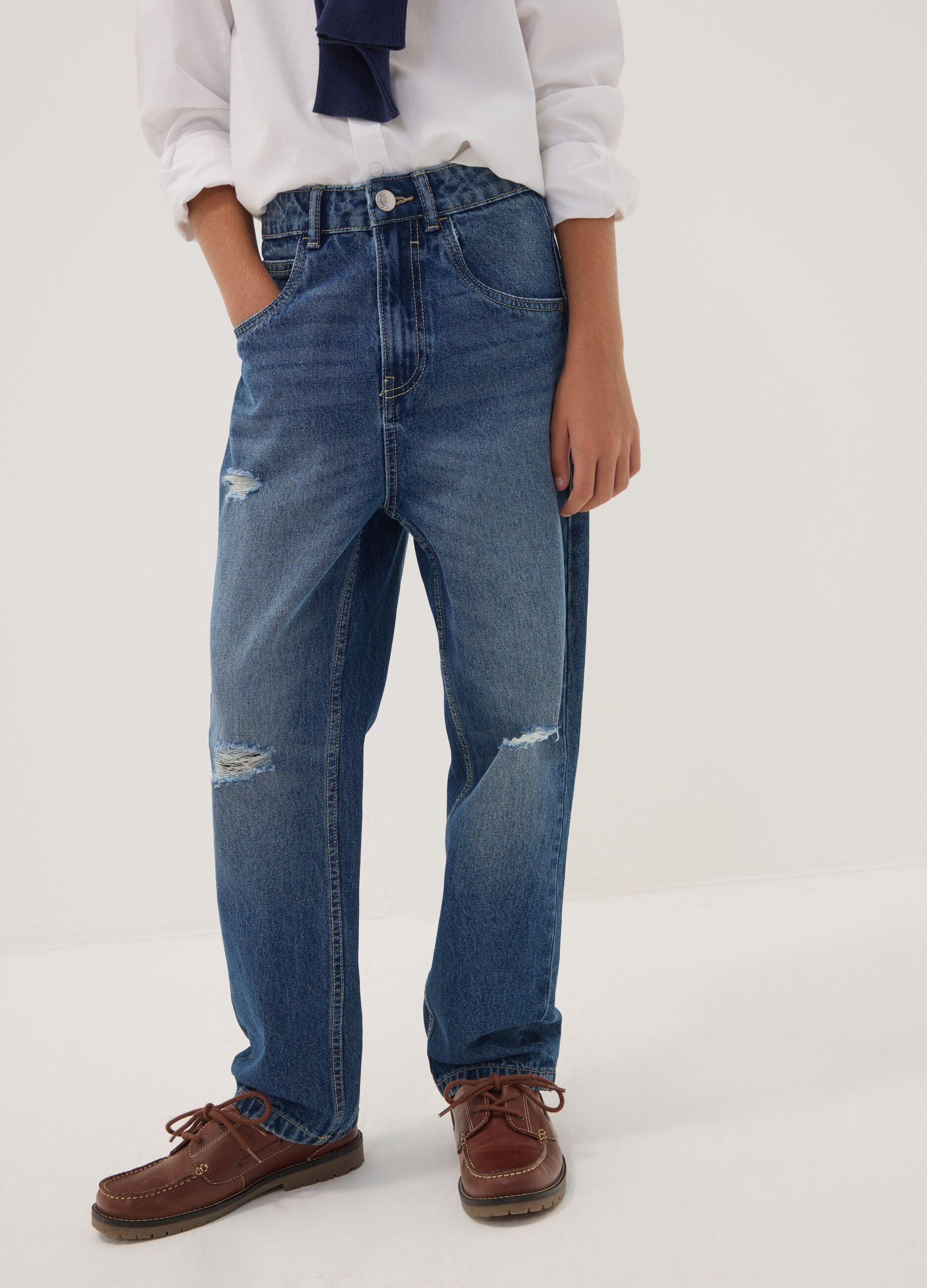 Jeans blu baggy in puro cotone con strappi per ragazzo