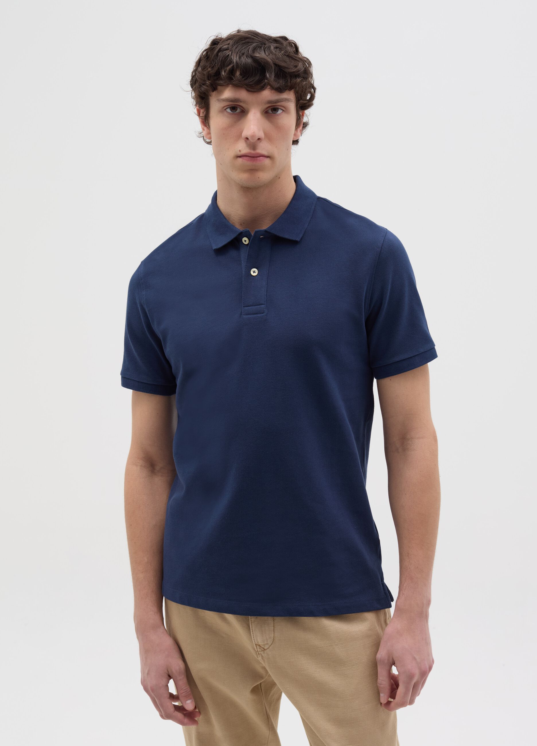 Solid colour polo shirt in organic cotton