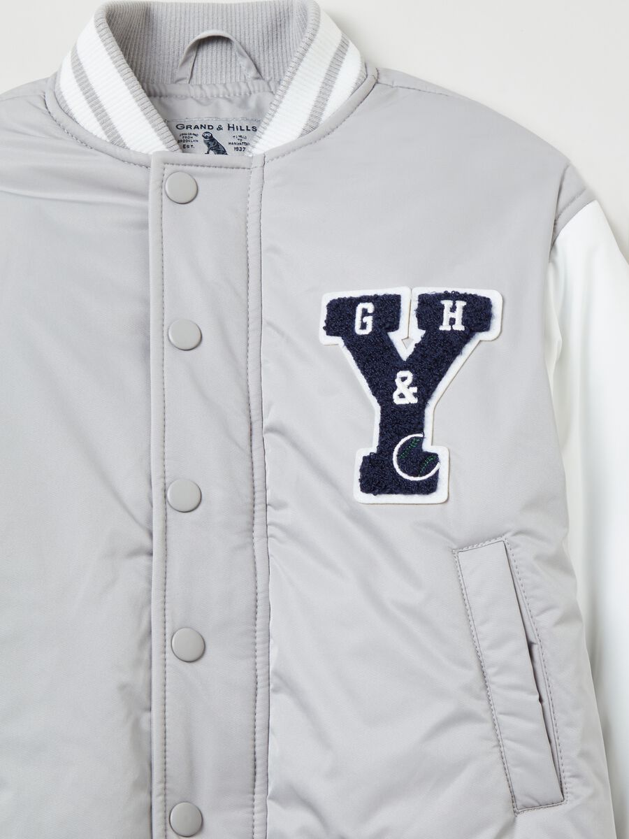 Giacca varsity imbottita con patch lettering_1
