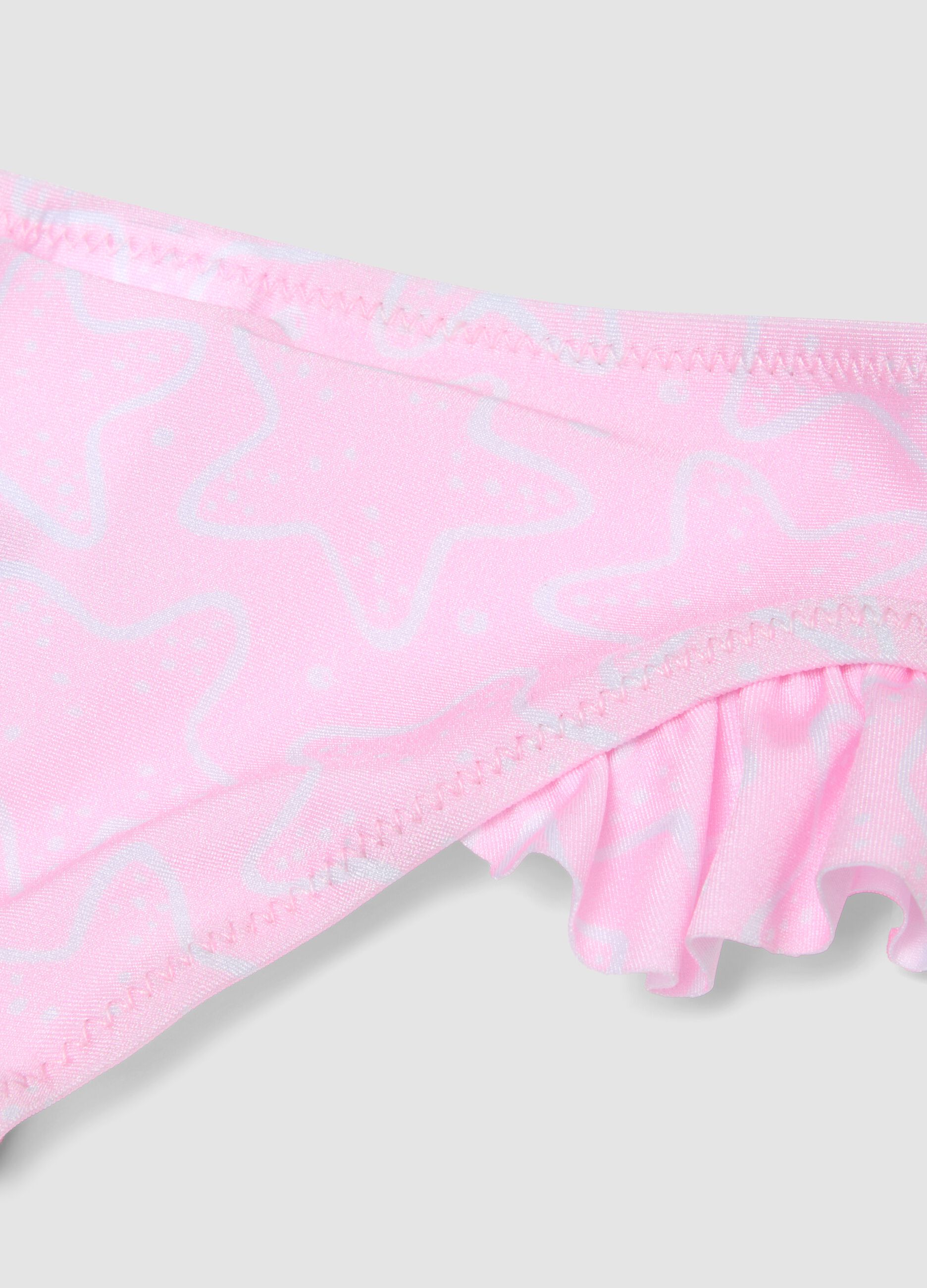 Pink baby swim briefs in stretch fabric with ruffles