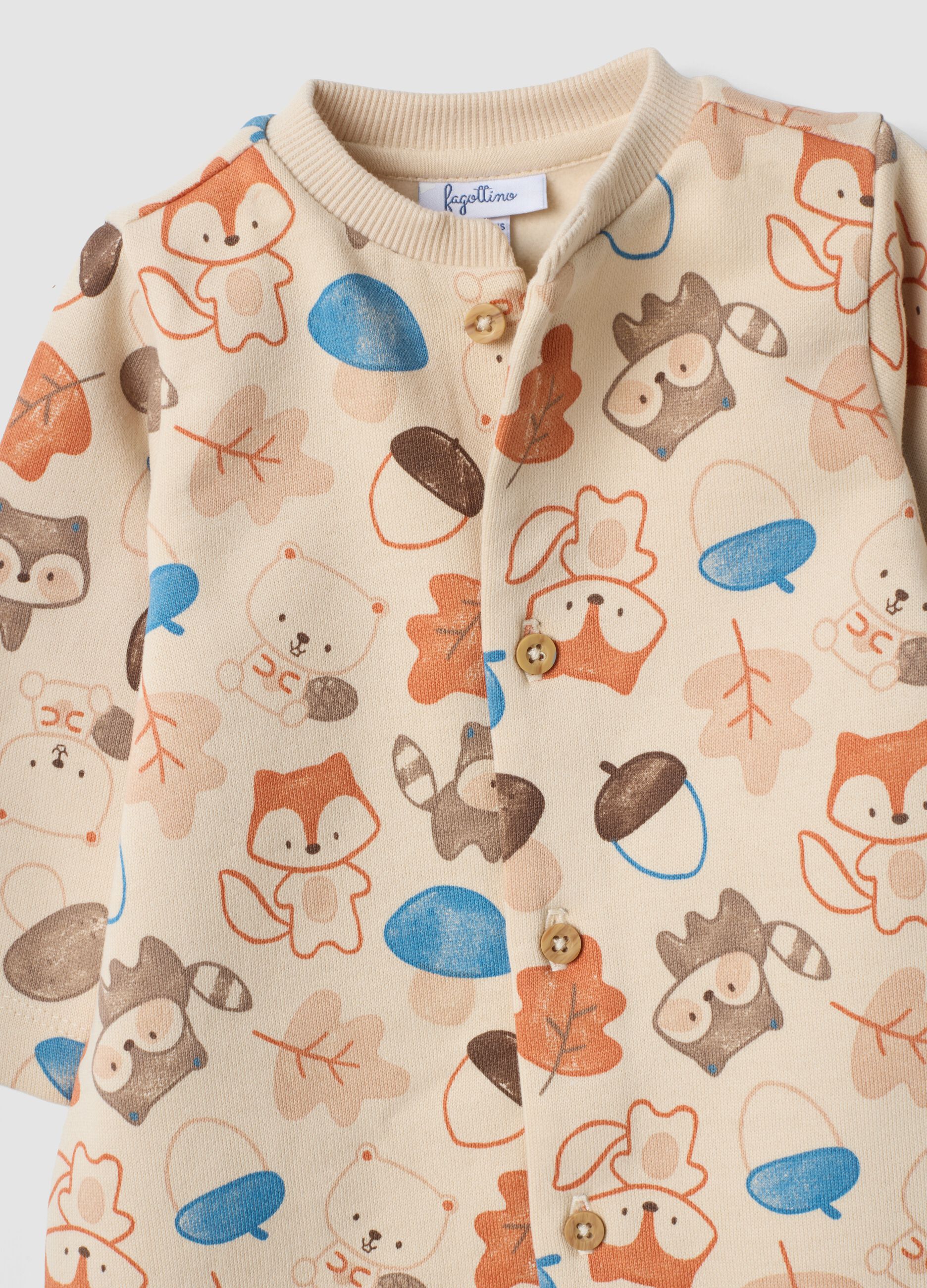 Tutina beige in puro cotone organico con stampa animali