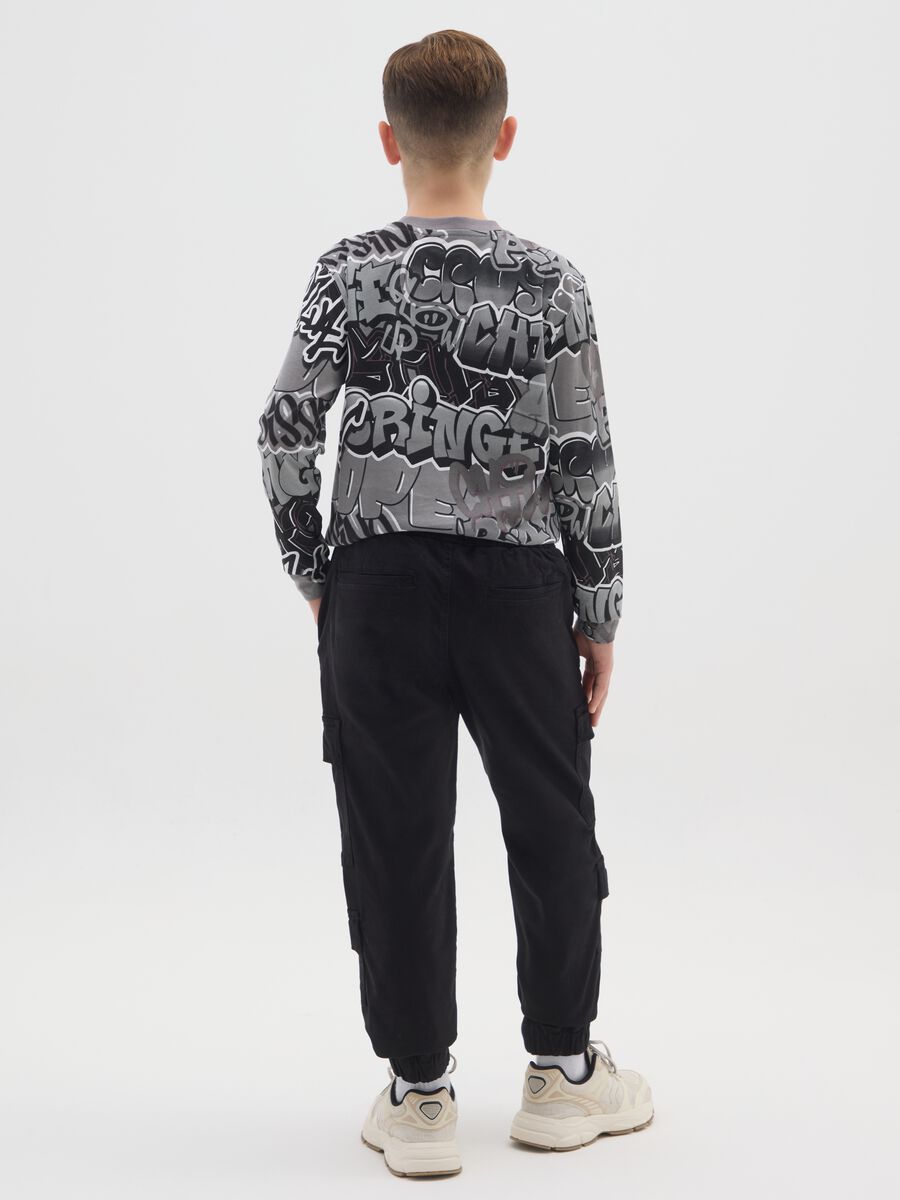 Black stretch cotton cargo trousers for boys_1