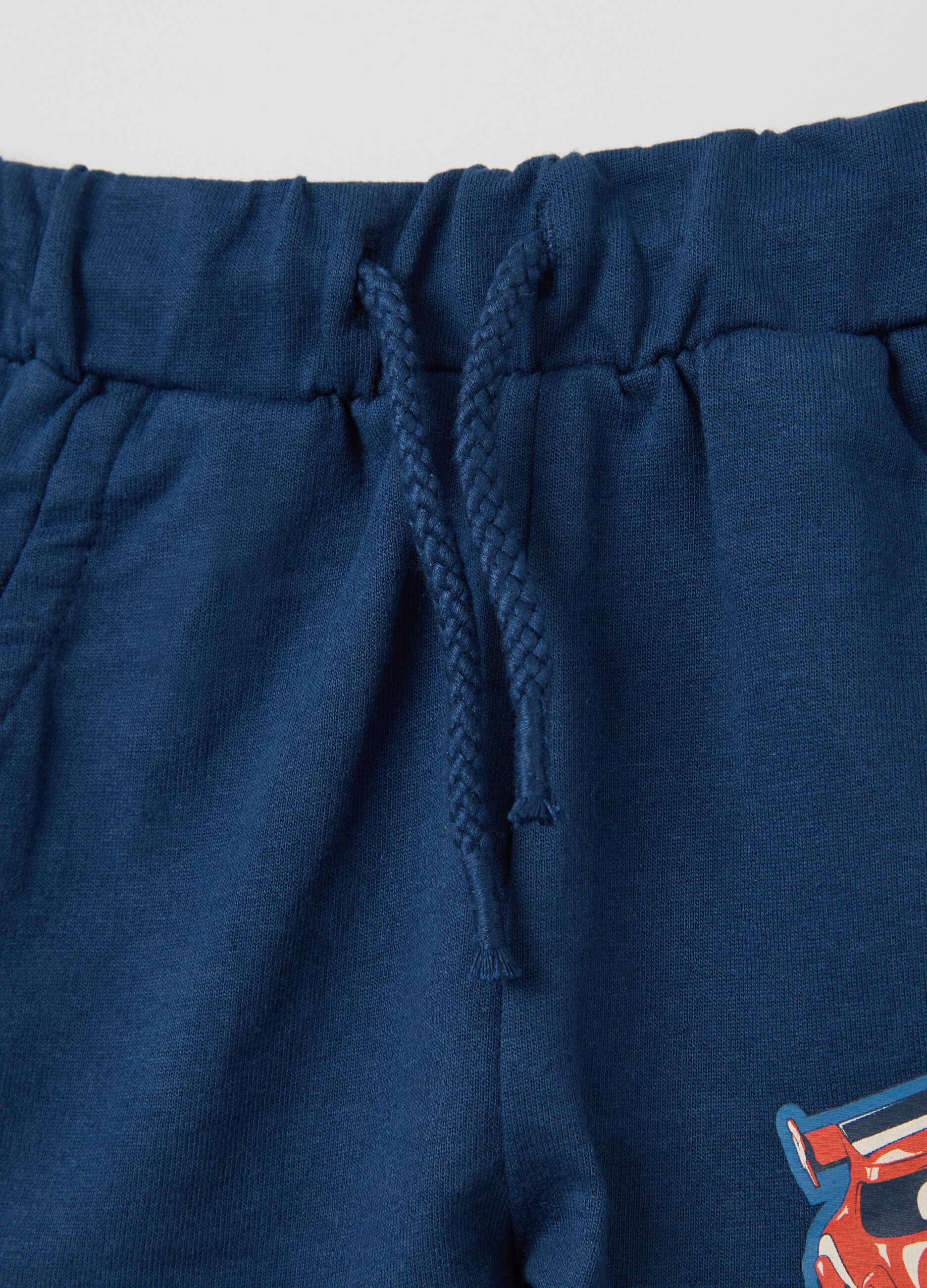 White and blue jogging set in cotton with Batwheels print