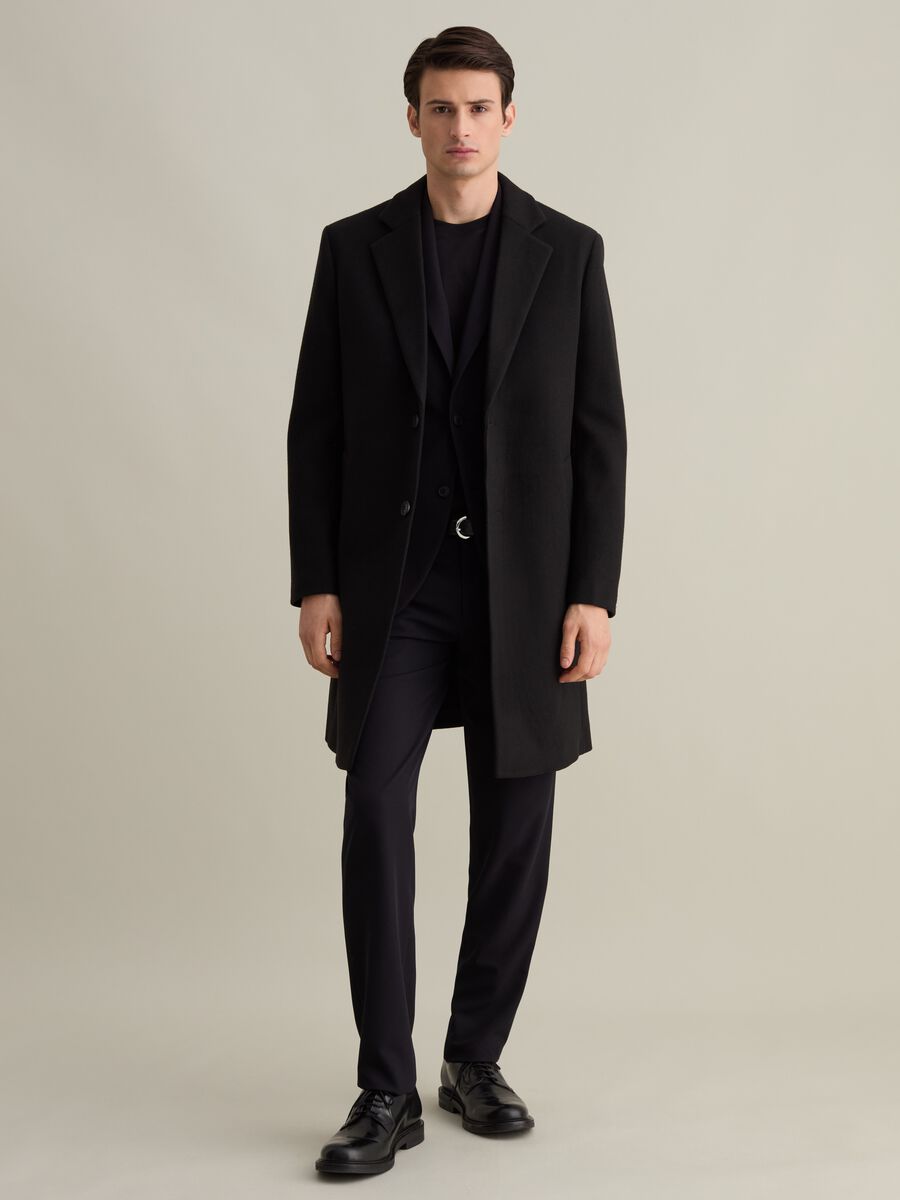 Long single-breasted solid colour coat_3