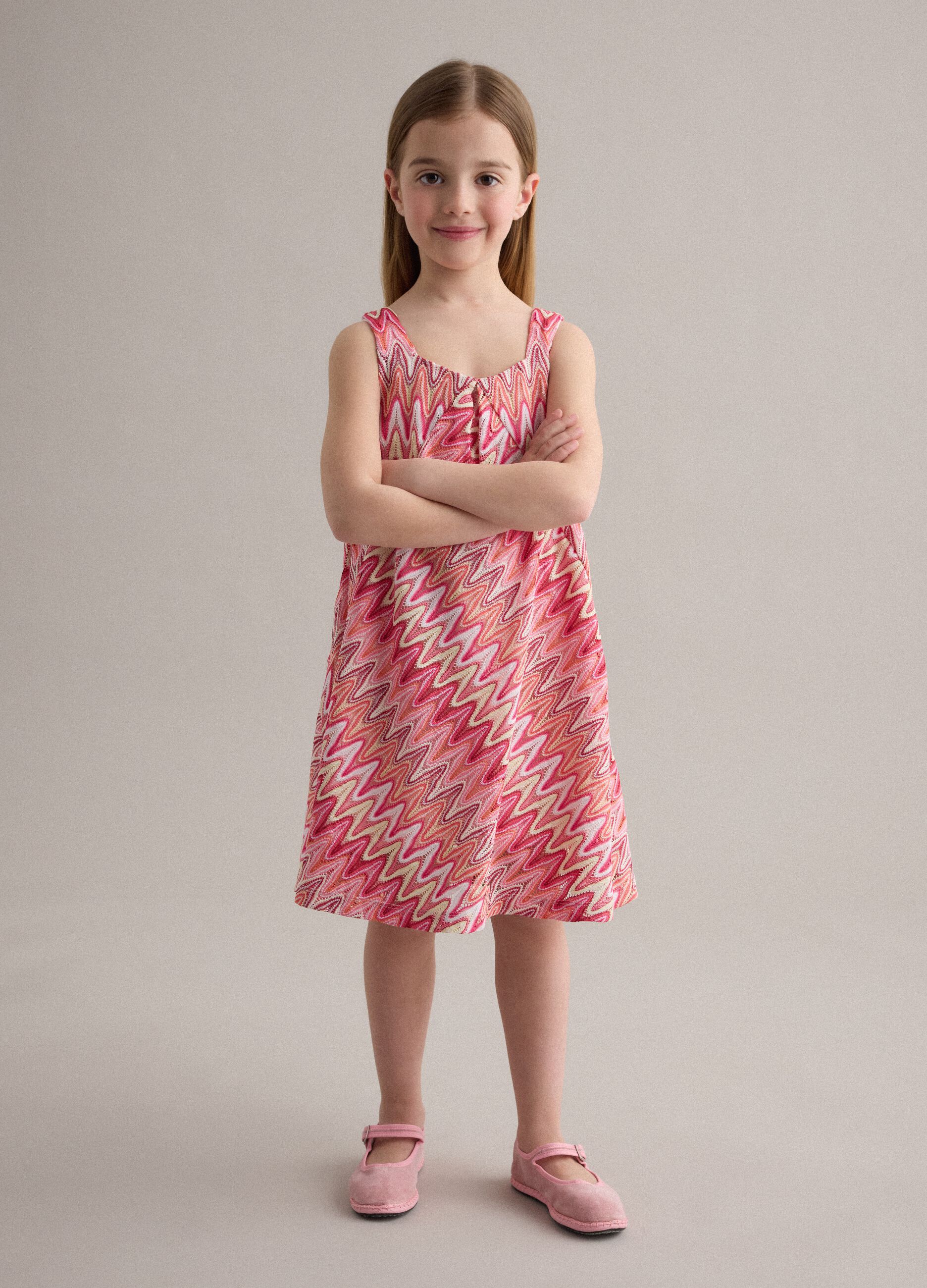 Pink sleeveless dress with wave print