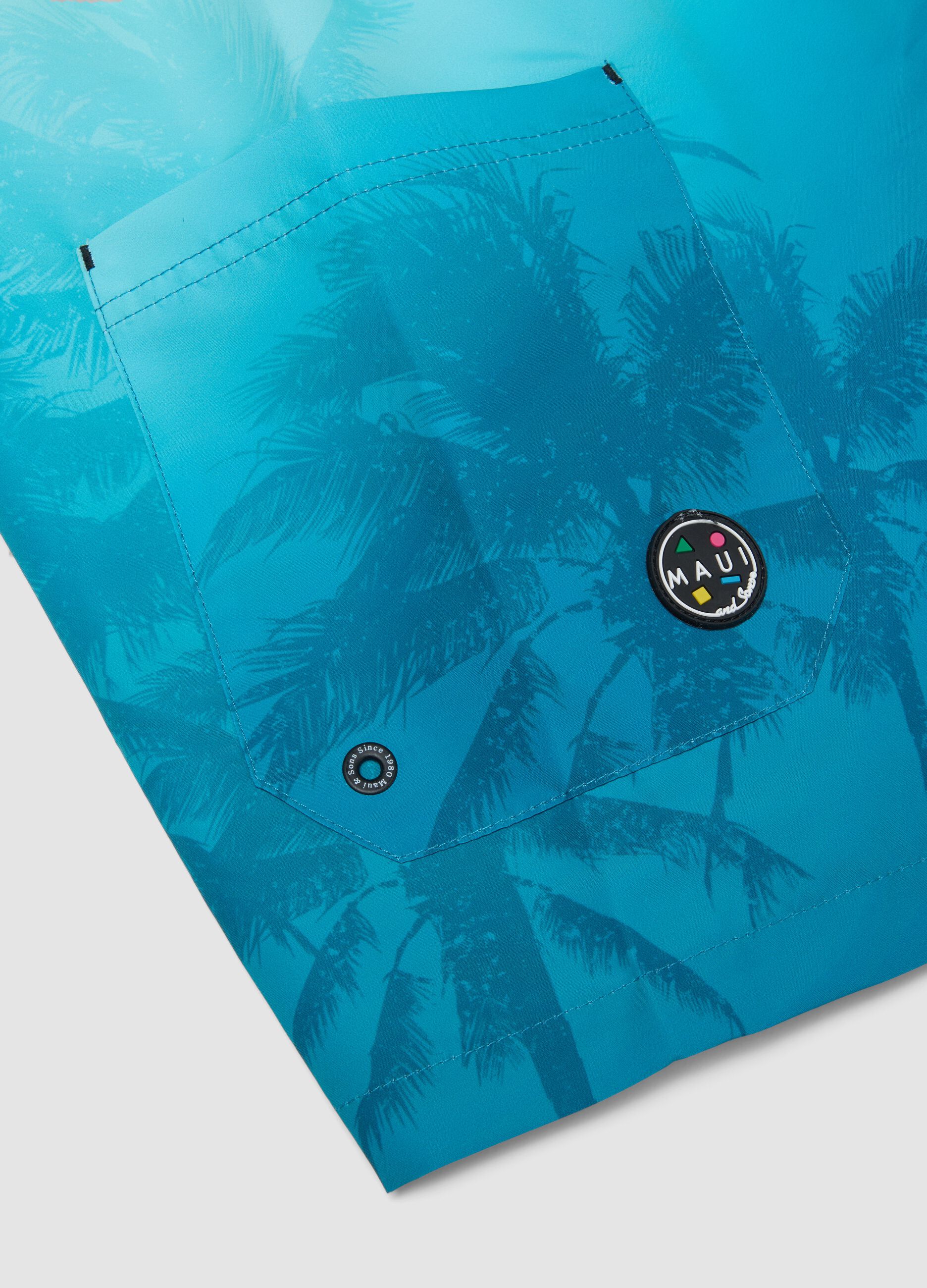 Blue tropical-print swim shorts