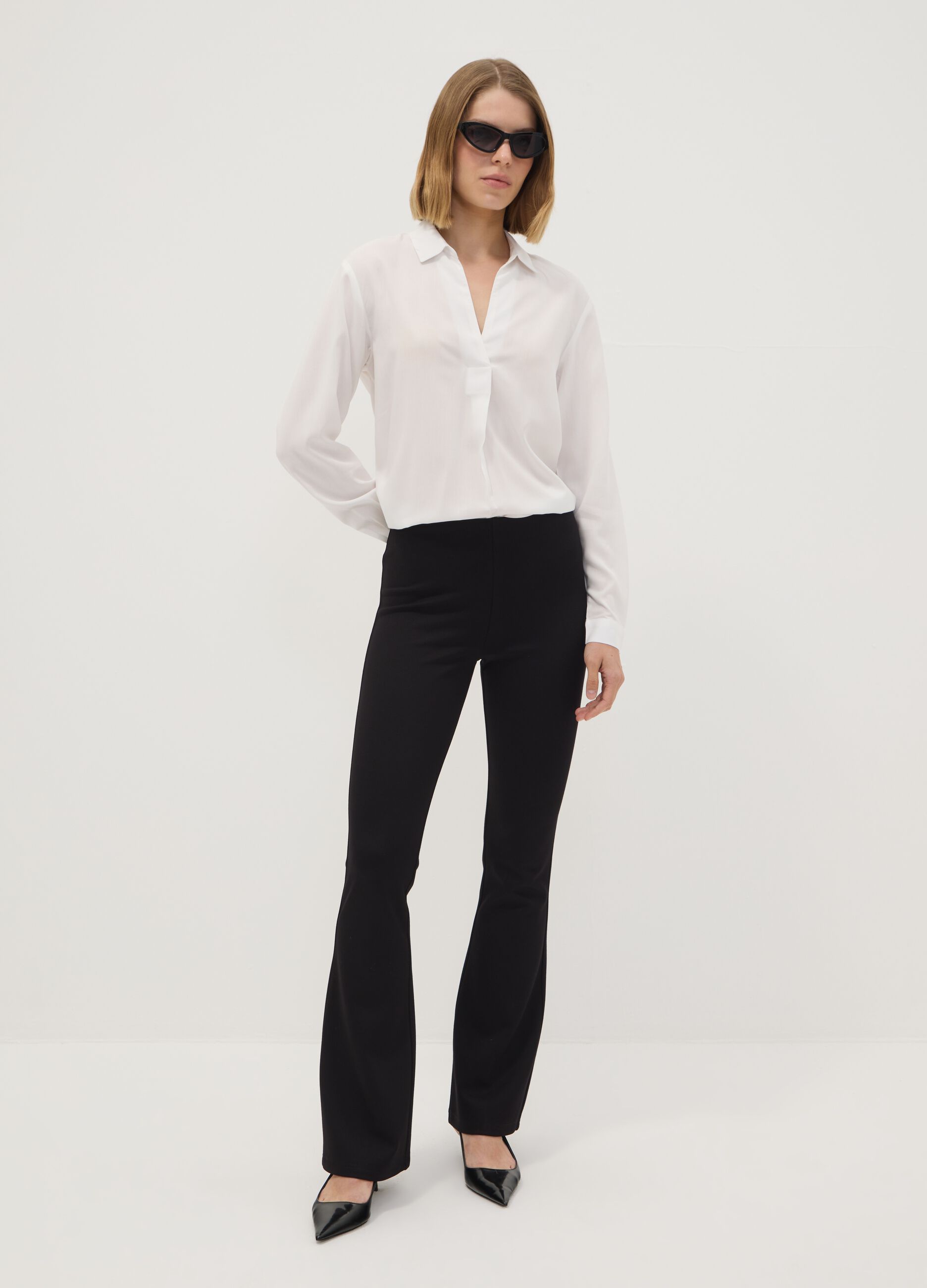 Leggings neri flare fit in punto Milano di viscosa elasticizzata