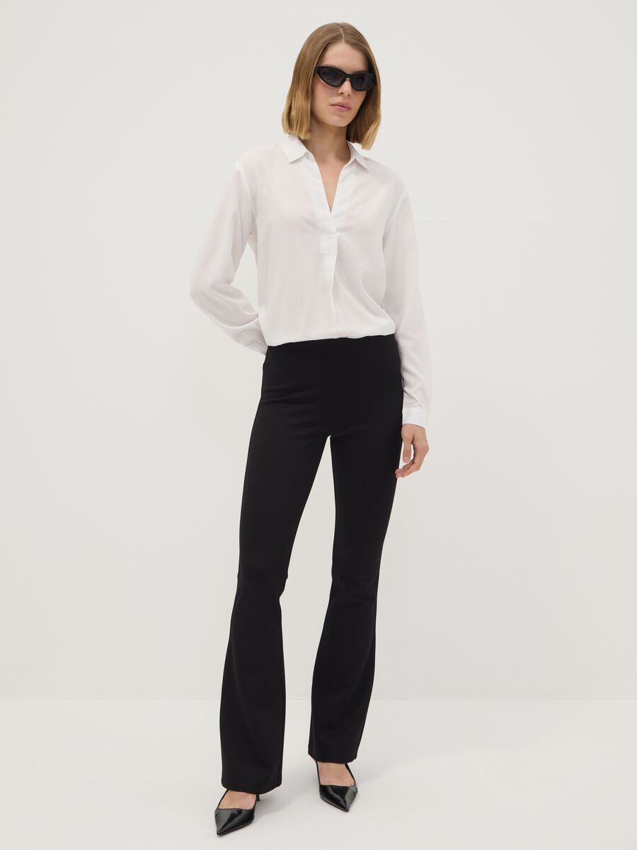 Leggings neri flare fit in punto Milano di viscosa elasticizzata_0
