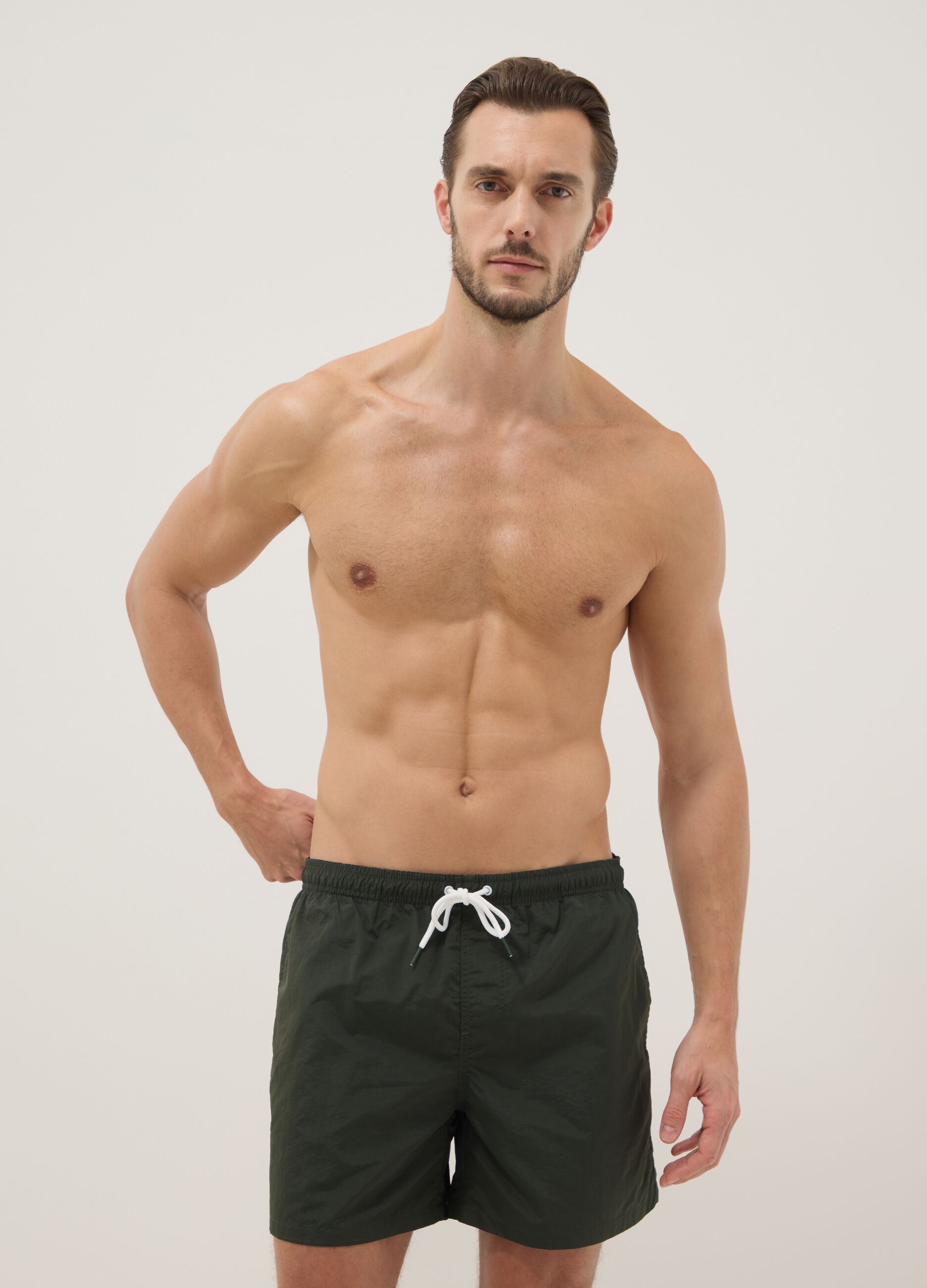 Green regular-fit swim shorts with drawstring