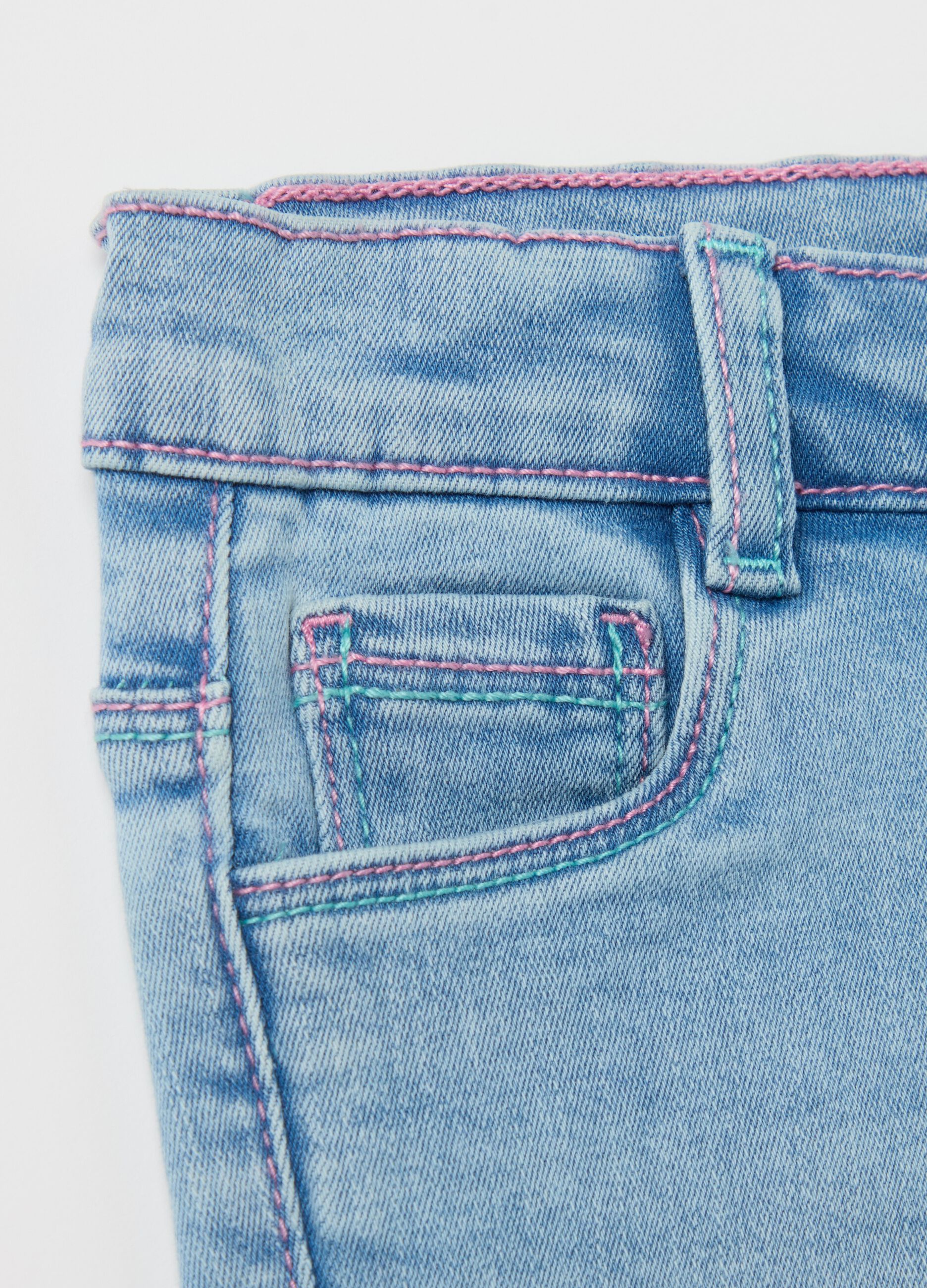 Jeans with five pockets and hearts and flowers embroidery