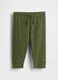Green cotton trousers with tractor print_0