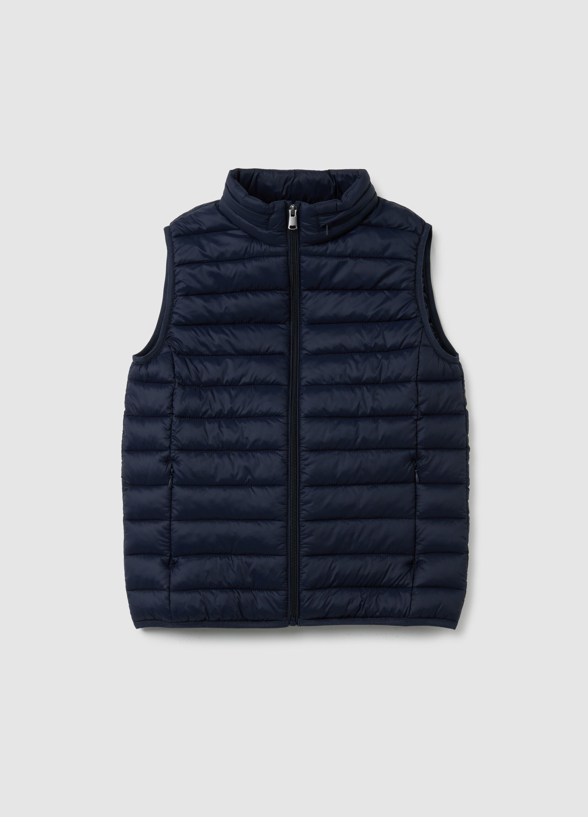 Boy's blue gilet with high collar