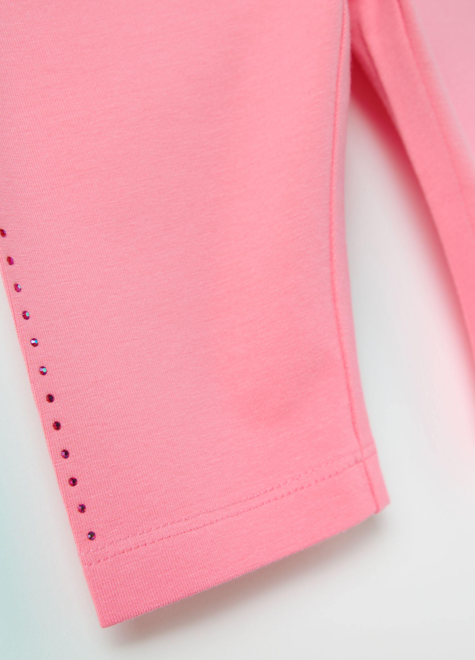 Pink three-quarter stretch leggings with diamantés