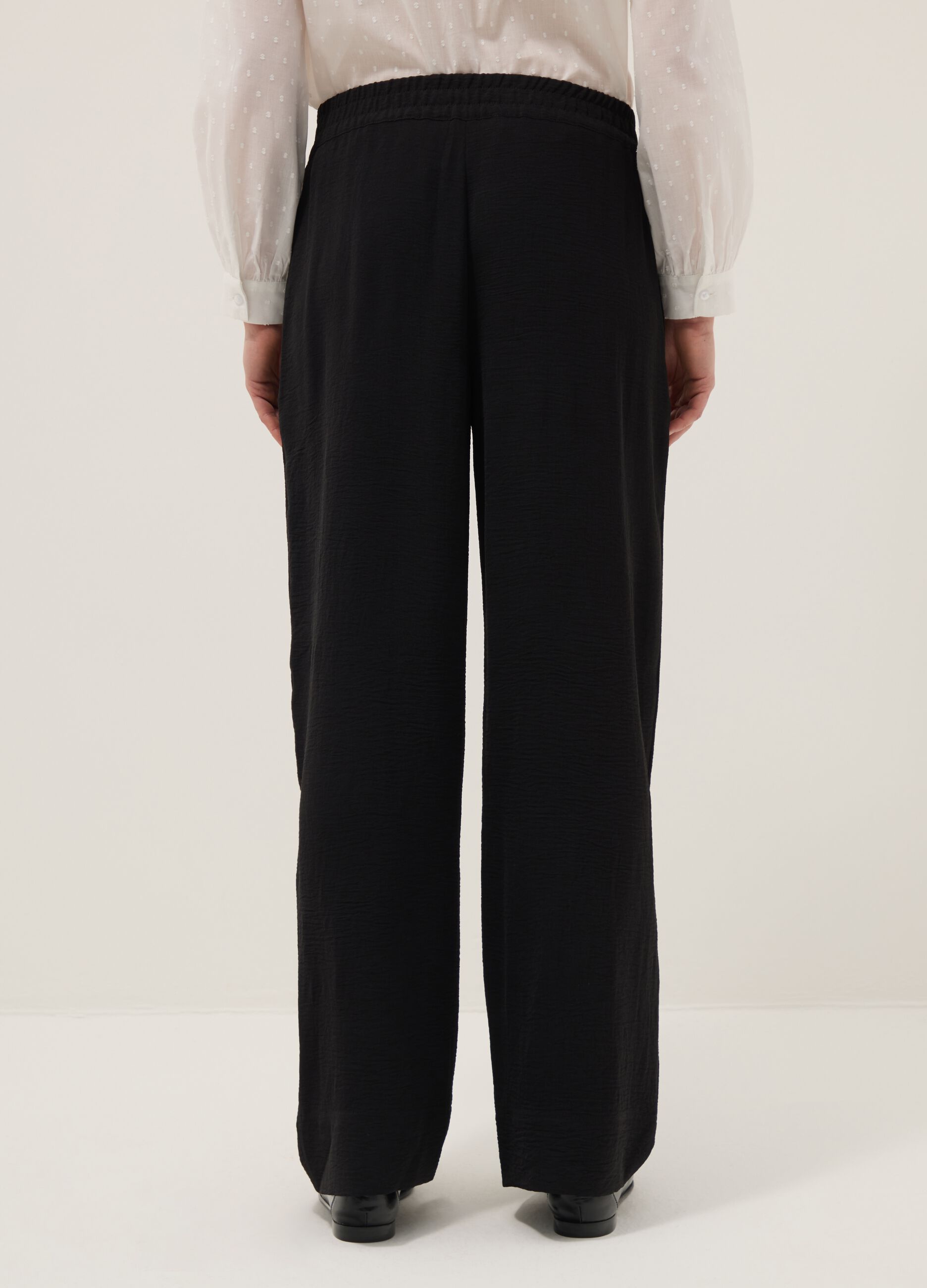 Black wide-leg trousers with elasticated waist