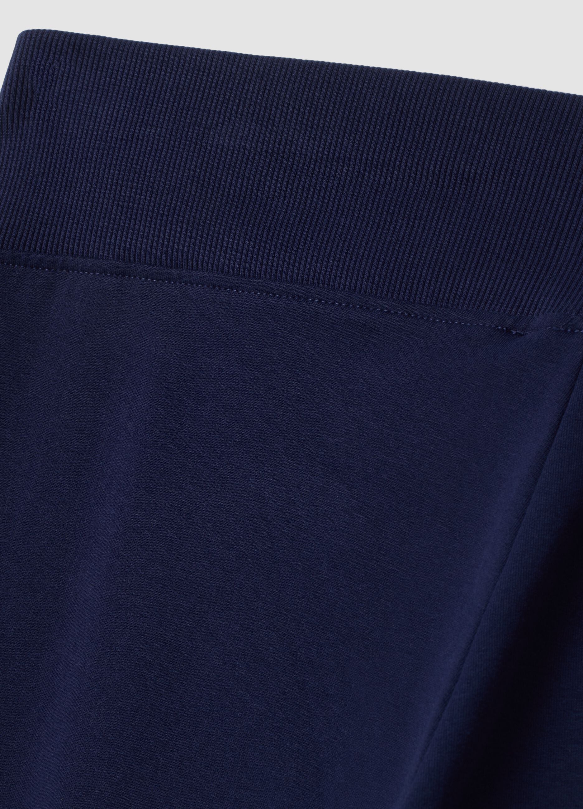 Blue bootcut trousers in stretch cotton