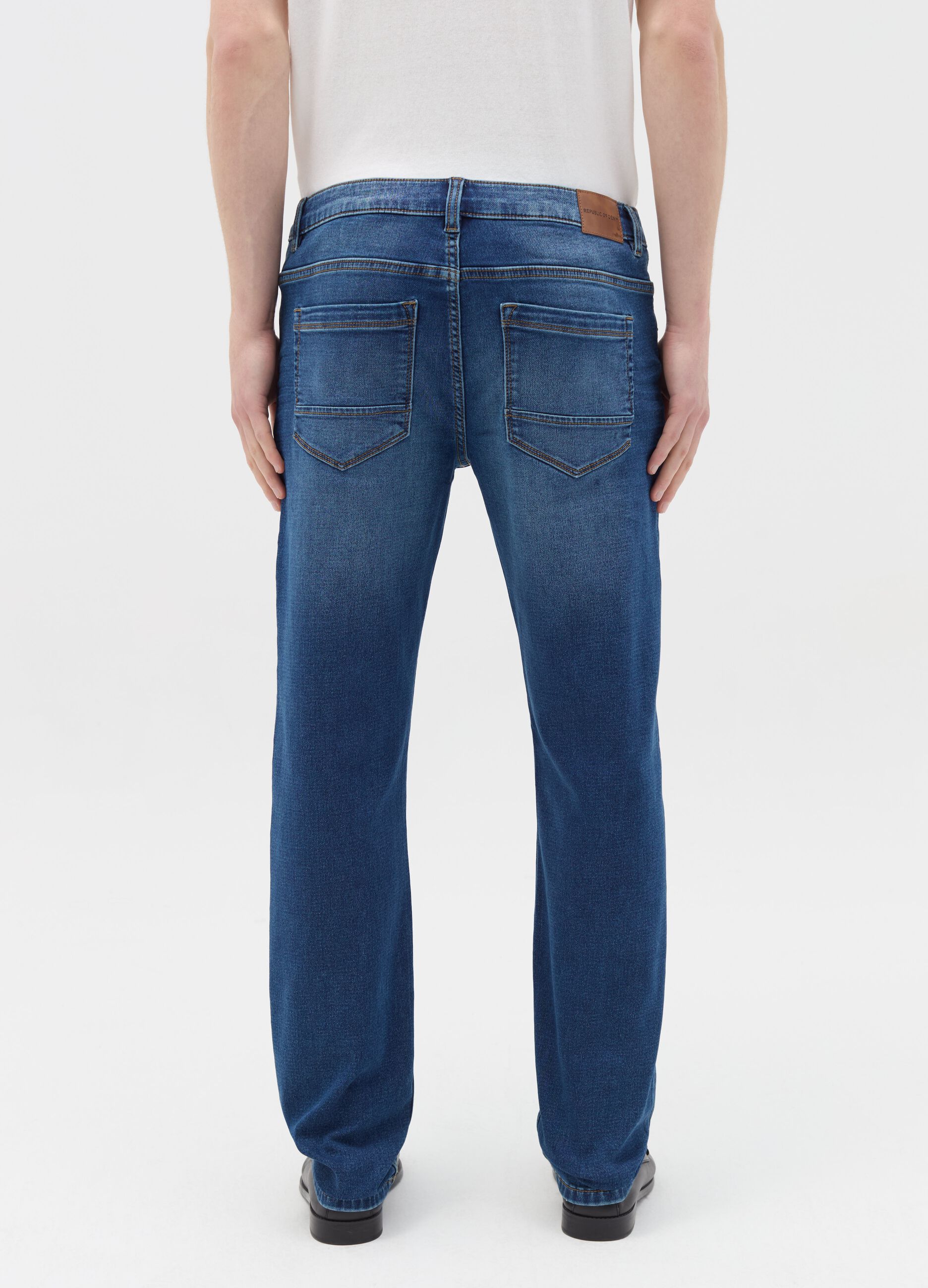 Slim-fit jeans with discolouring