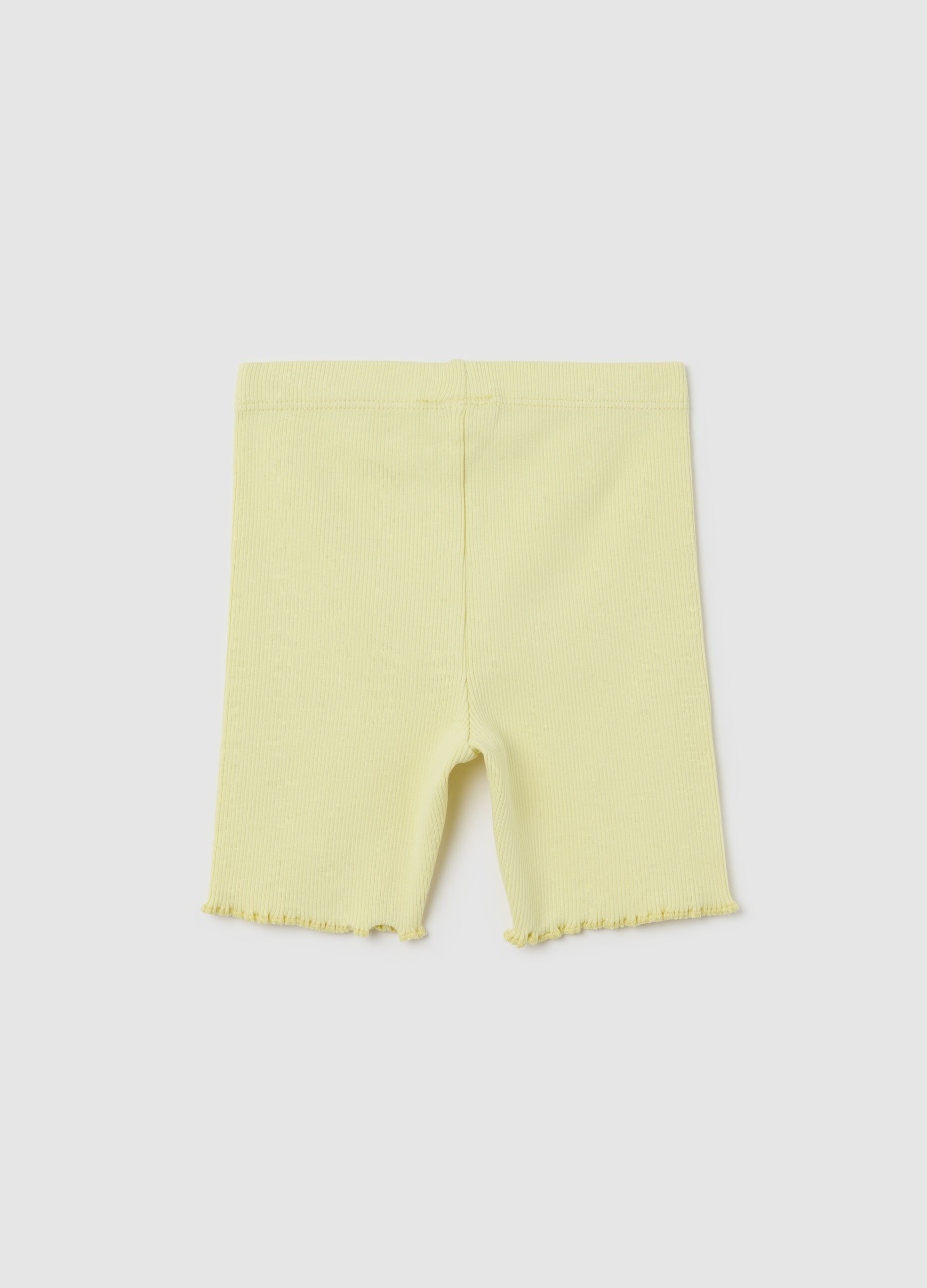Ribbed yellow shorts with wavy hem