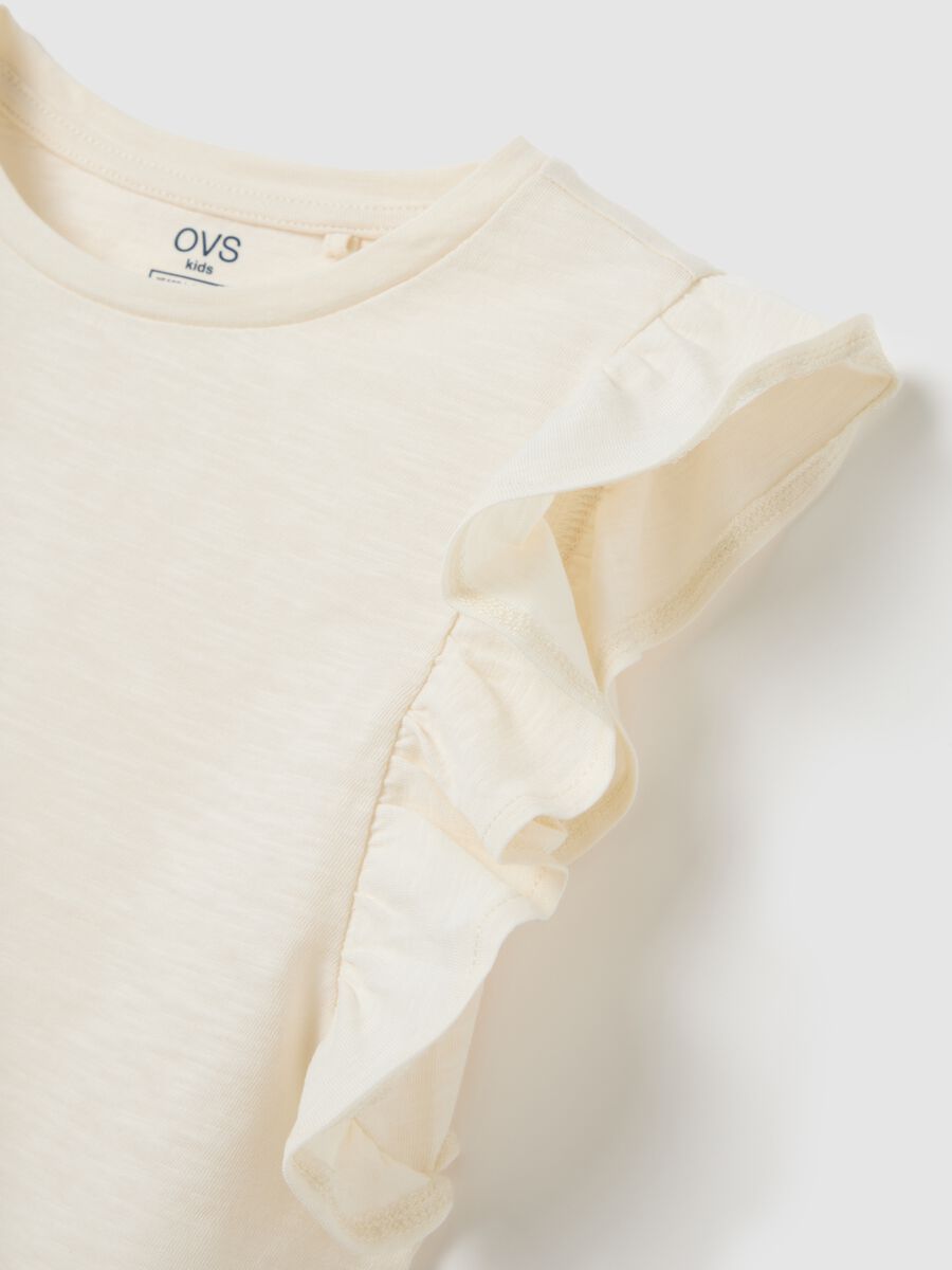 Top cropped da bambina in puro cotone bianco regular fit con volant_2
