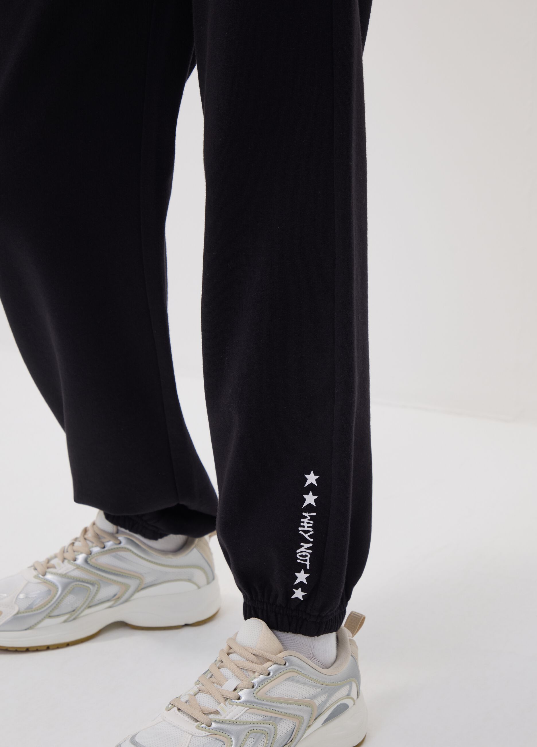 Black organic cotton-blend jogger trousers with printed detail for girls