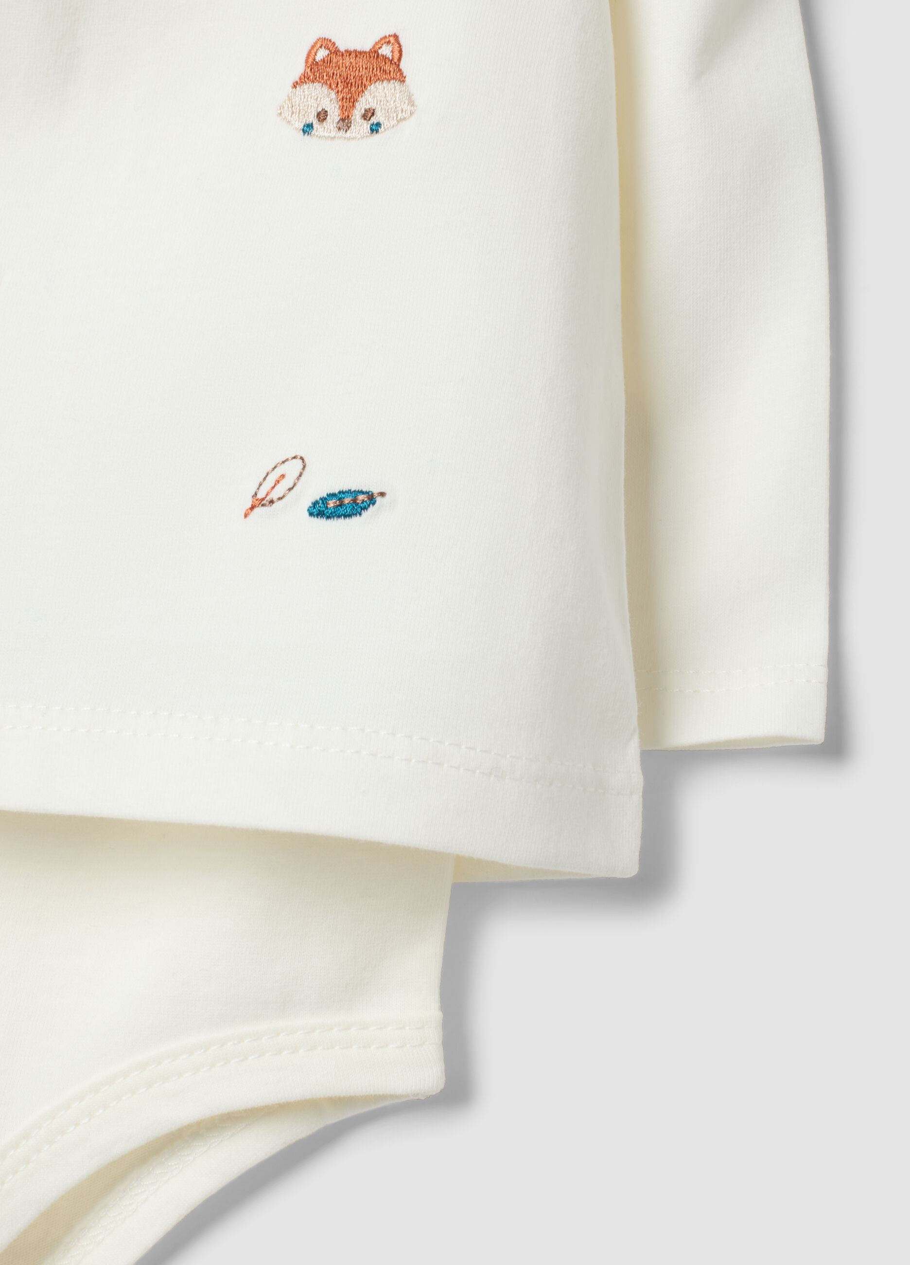 White organic cotton baby bodysuit with collar
