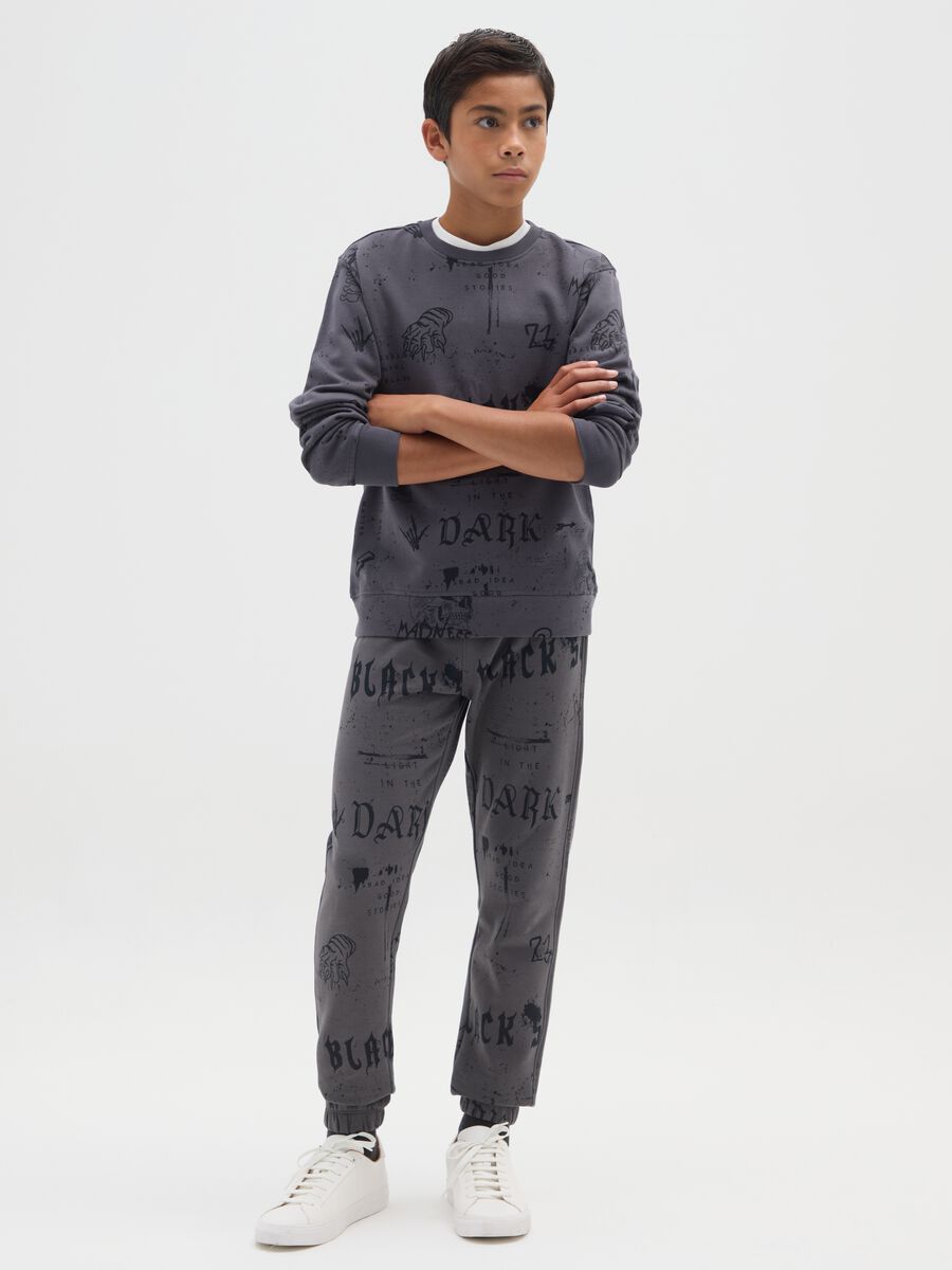 Pantaloni grigi da ragazzo in puro cotone regular fit con stampe_0