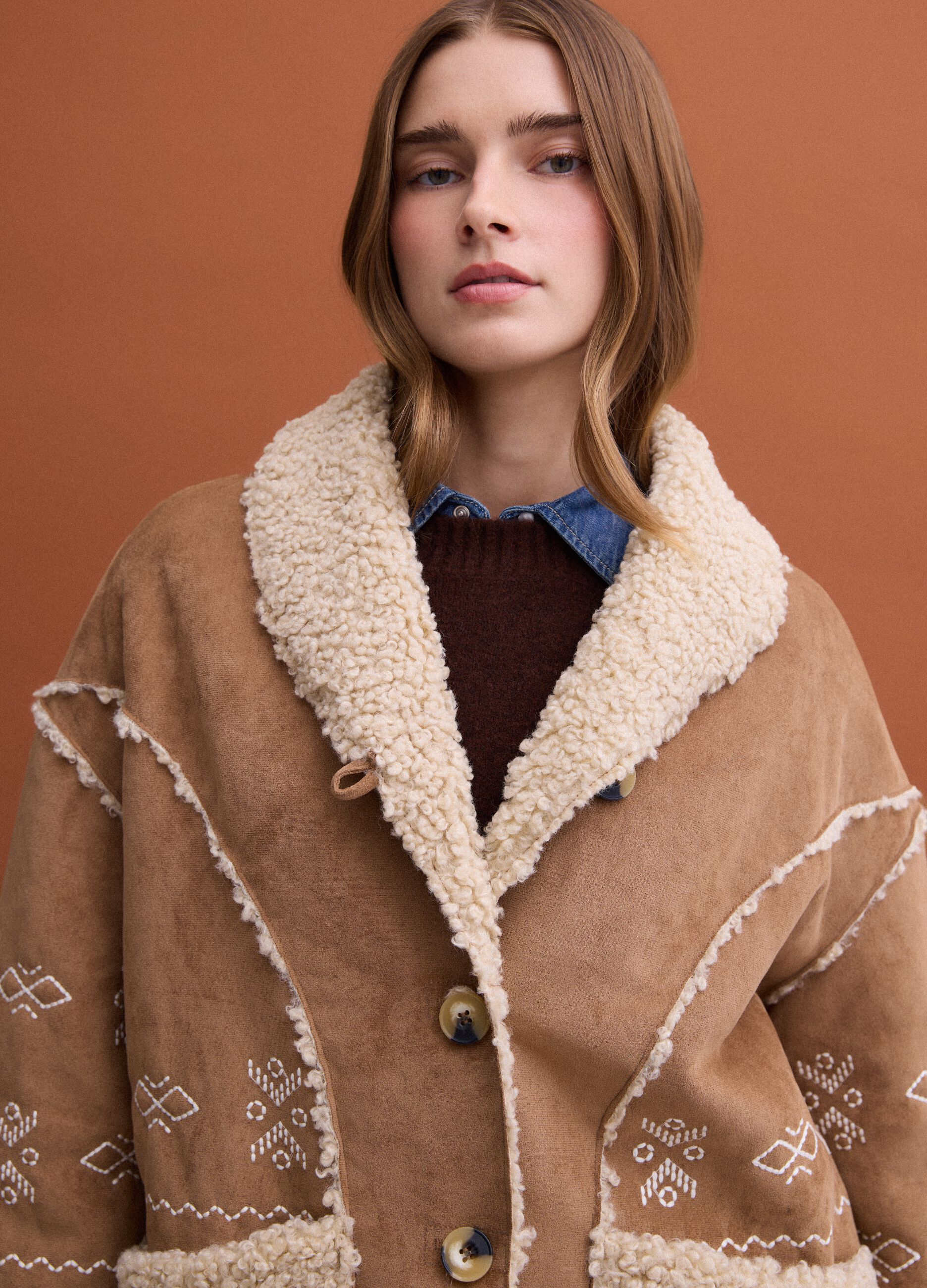Brown oversized jacket with faux shearling lining