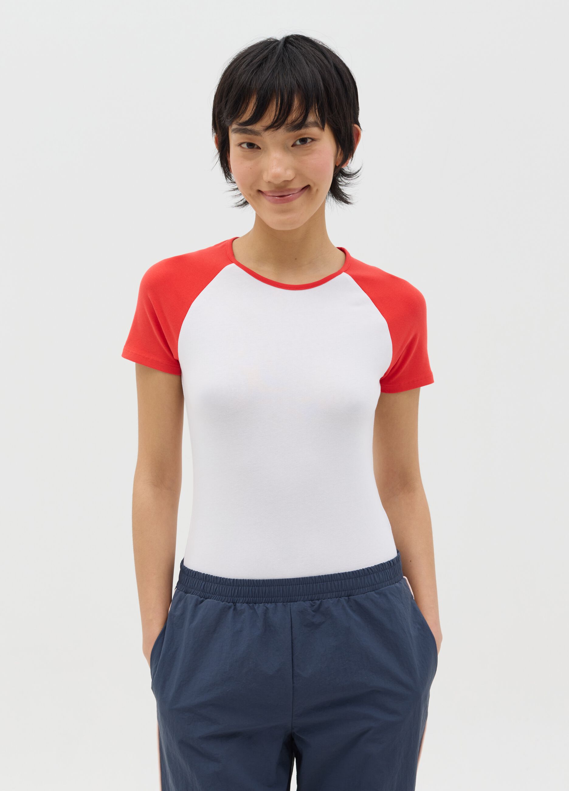 White bodysuit with short black sleeves