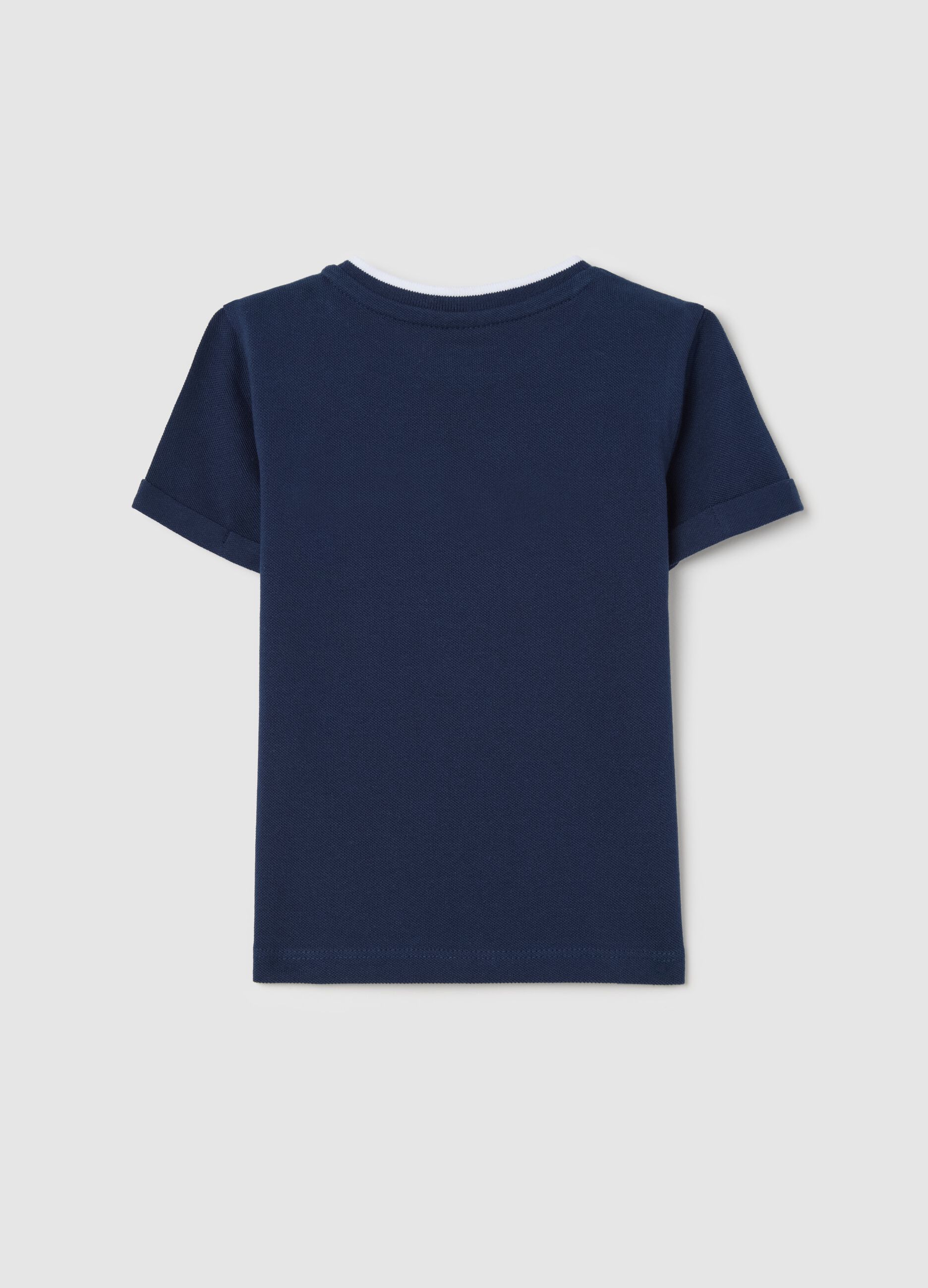 Blue T-shirt in organic cotton with welt pocket