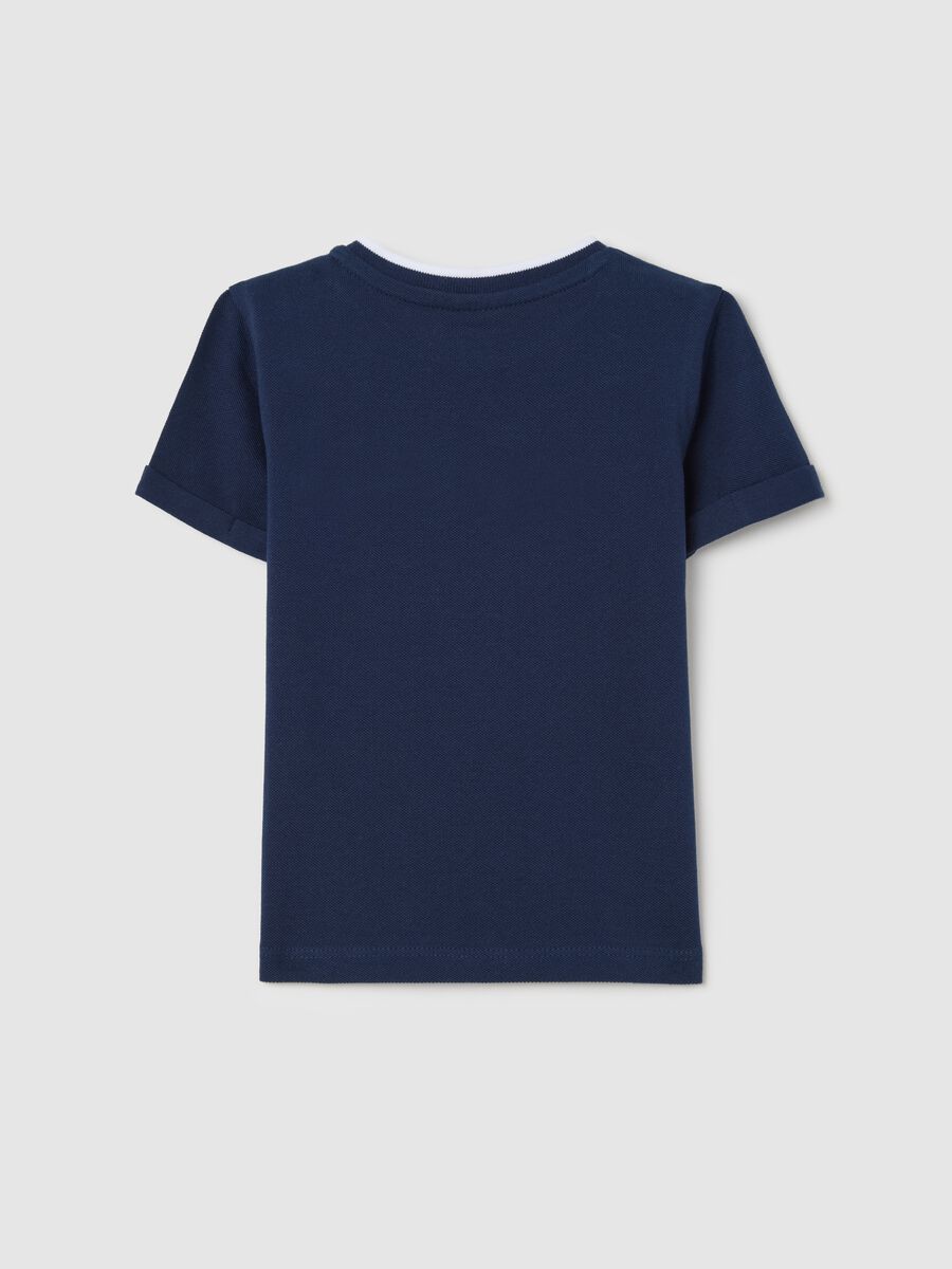 Blue T-shirt in organic cotton with welt pocket_1