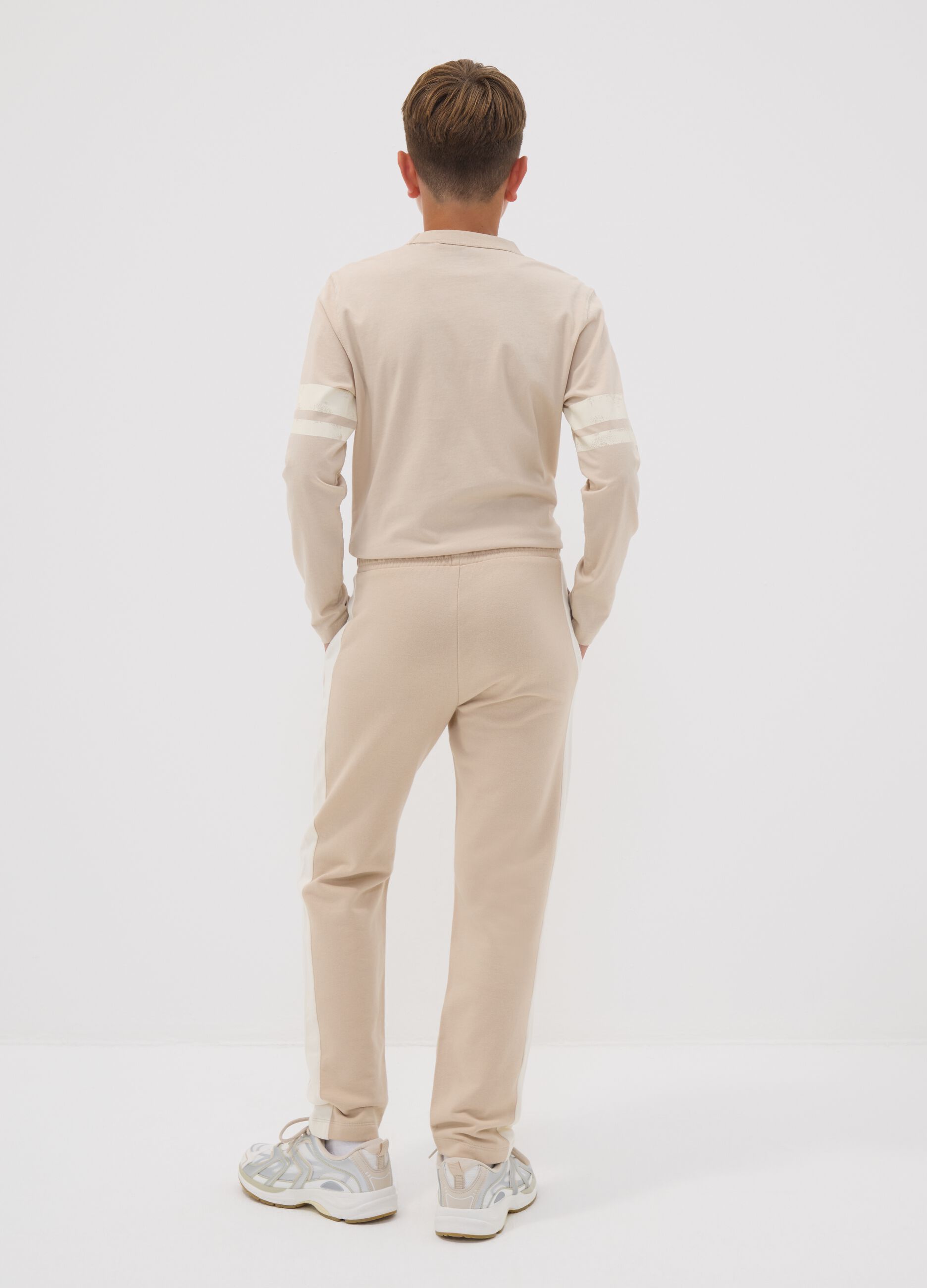 Beige pure cotton jogger trousers with side stripes for boys