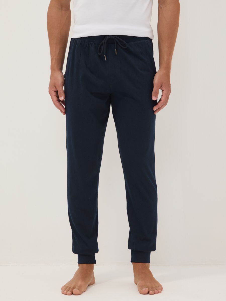 Pantaloni pigiama blu in cotone organico con coulisse_1