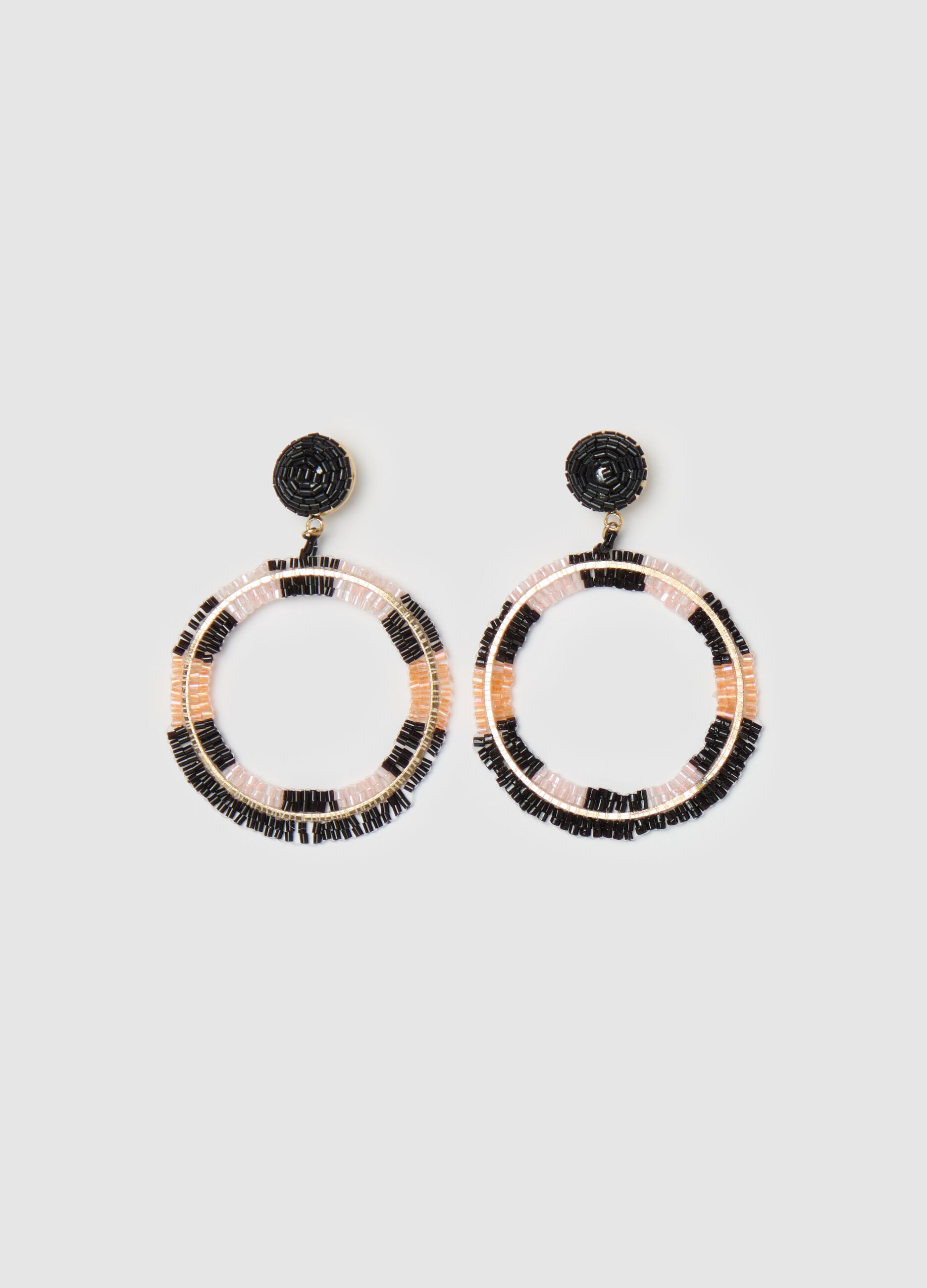 Earrings with beads and circle pendant