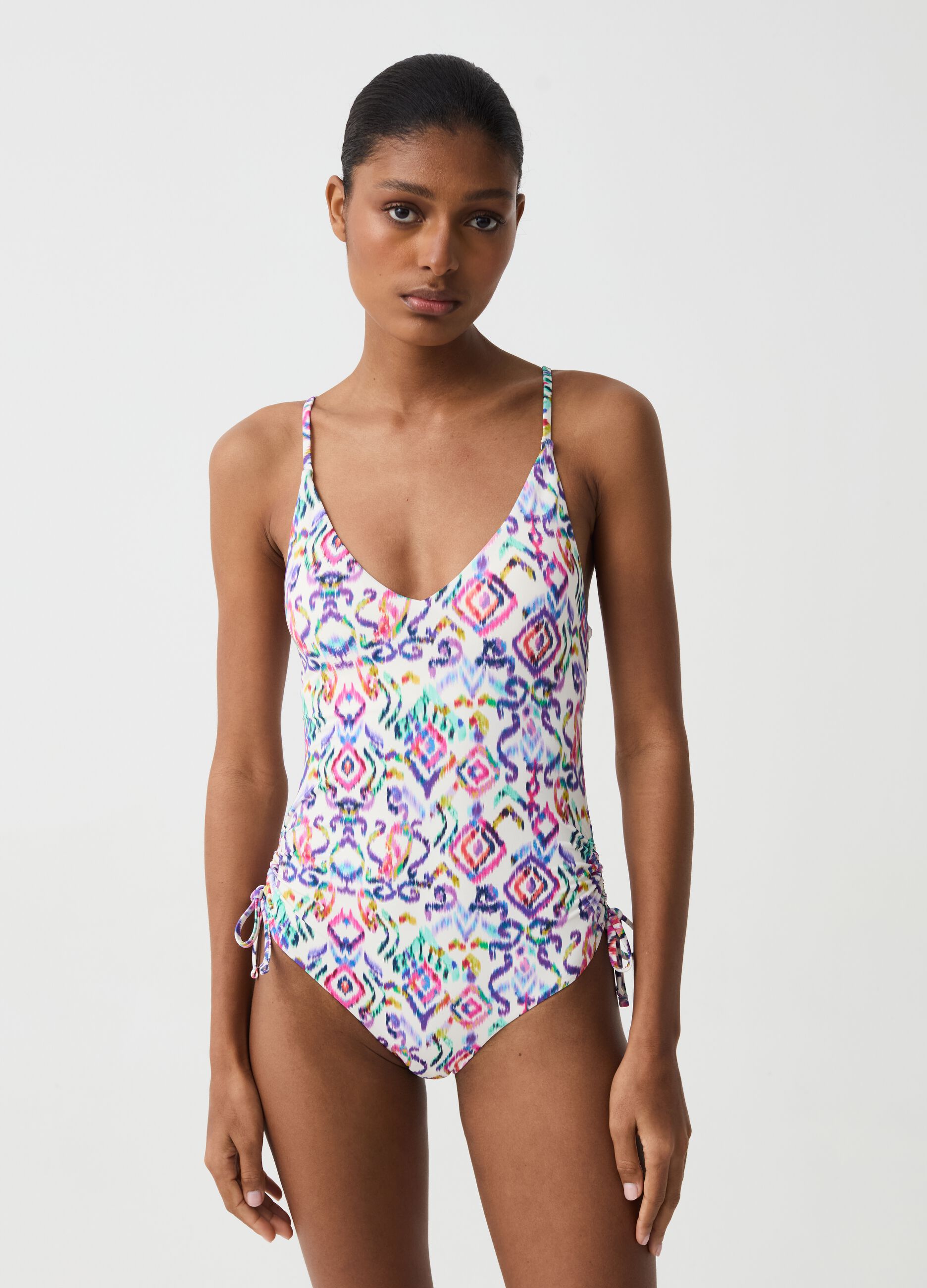 One-piece swimsuit with drawstring and ikat print